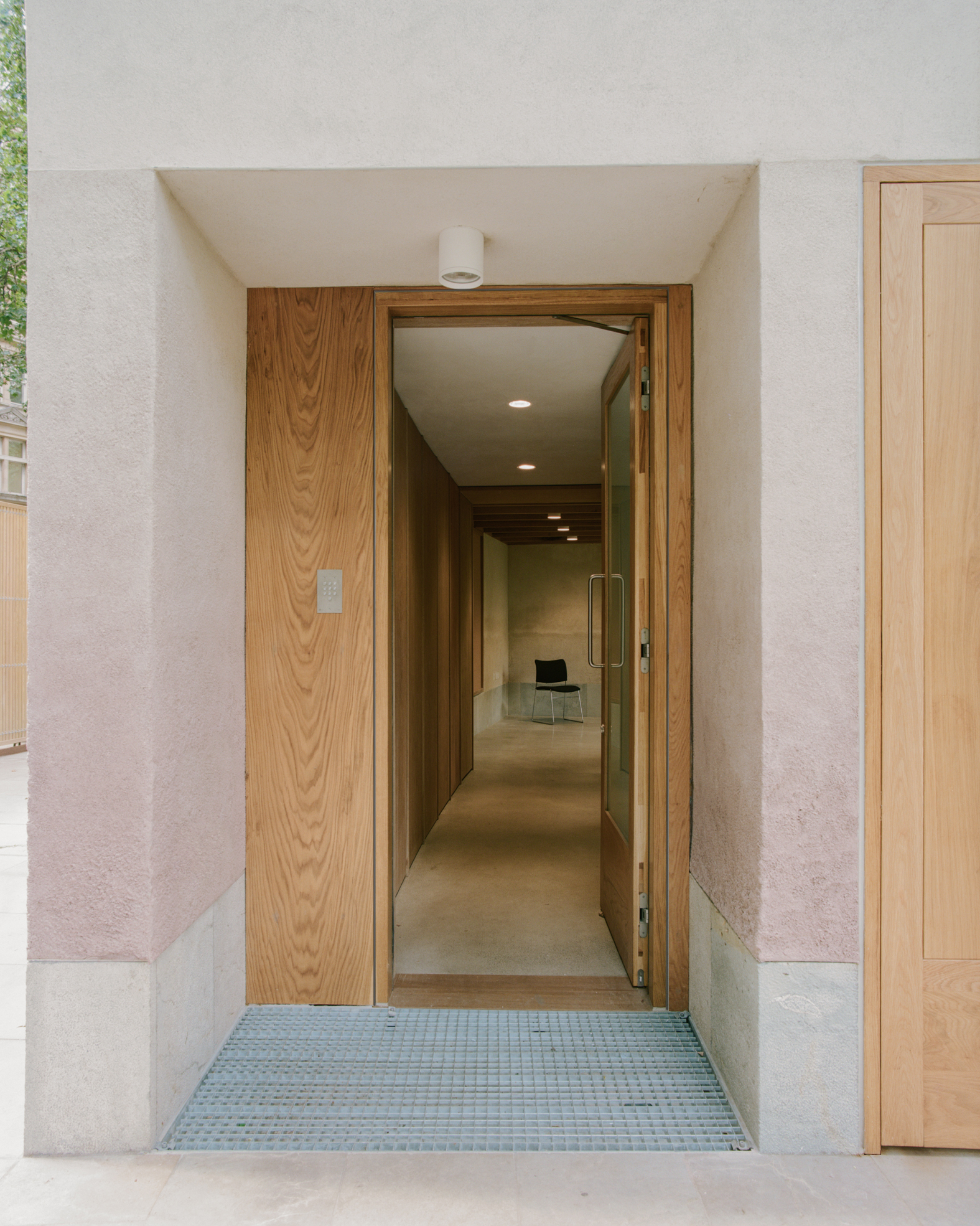 Finsbury Circus Parks Office by Studio Weave, photographed by Lorenzo Zandri — An oak-lined entrance threshold leads into a corridor serving the kitchenette, sitting room and equipment stores.