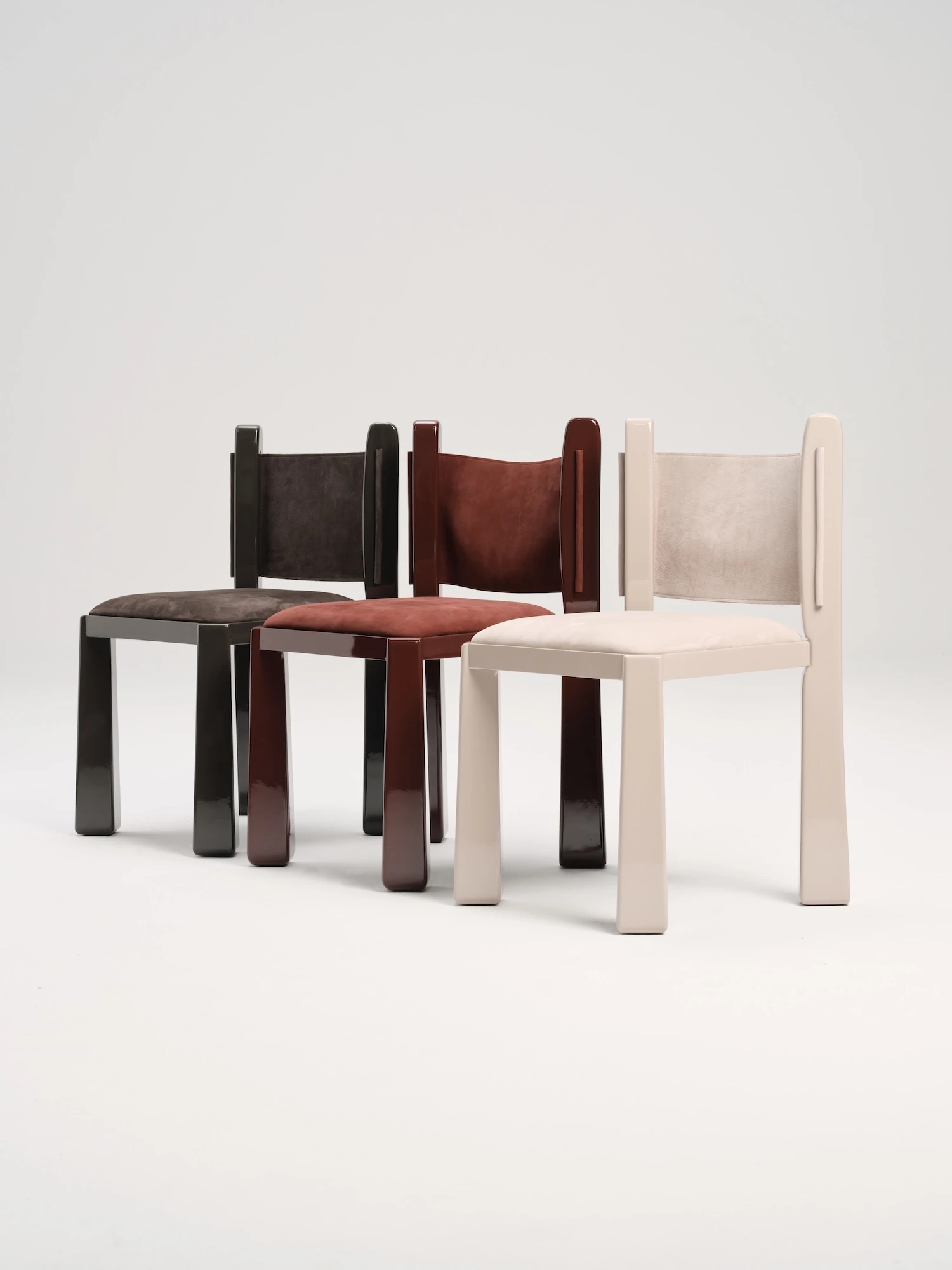 Ruby by NOVSEP, photographed by NOVSEP — The three colourways together on white, espresso, oxblood and greige in a row.