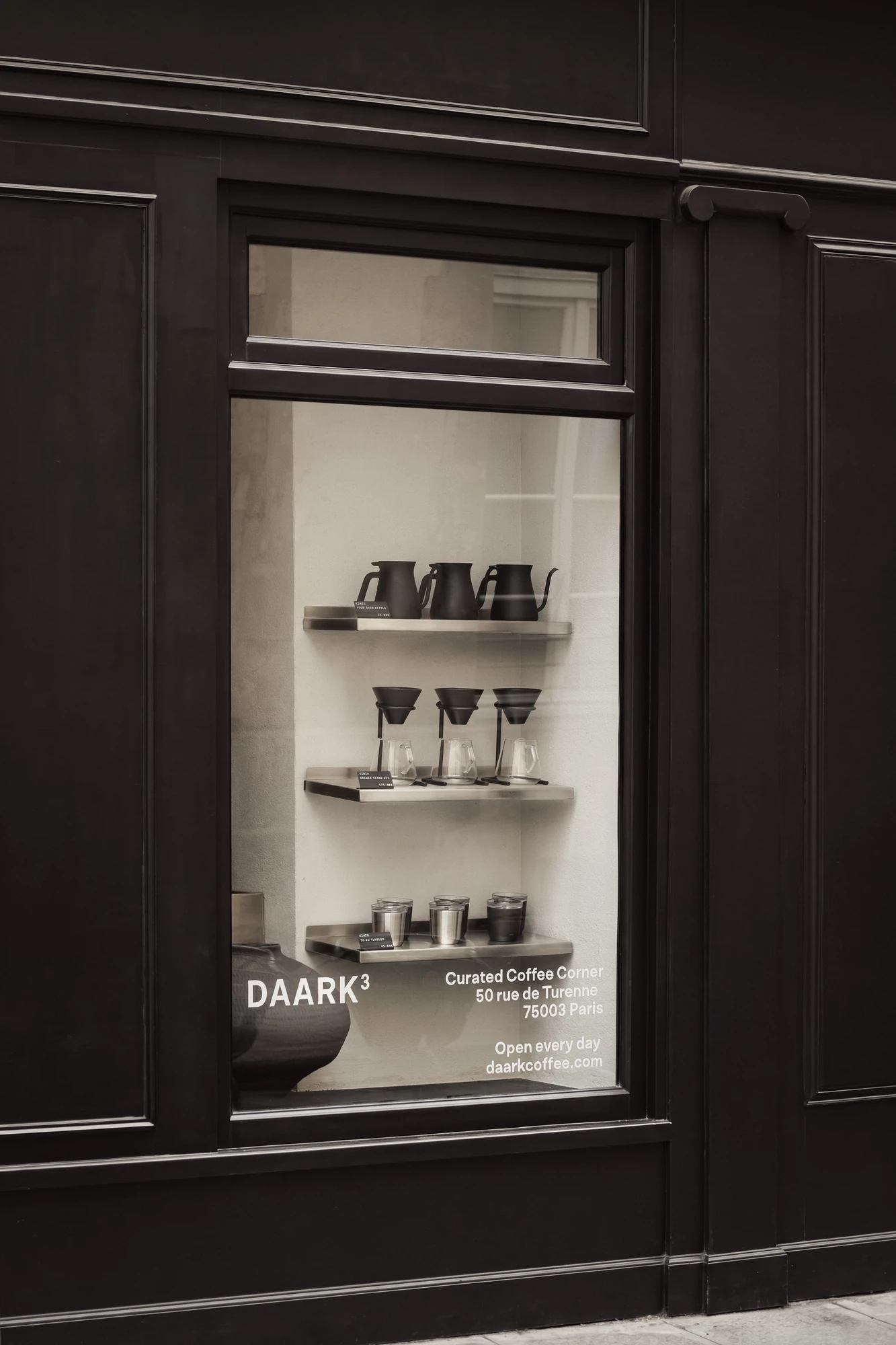 DAARK by Rodaa Studio, photographed by Adrien Ozouf — Brewing equipment arranged in the DAARK window display, rue de Turenne, Paris.