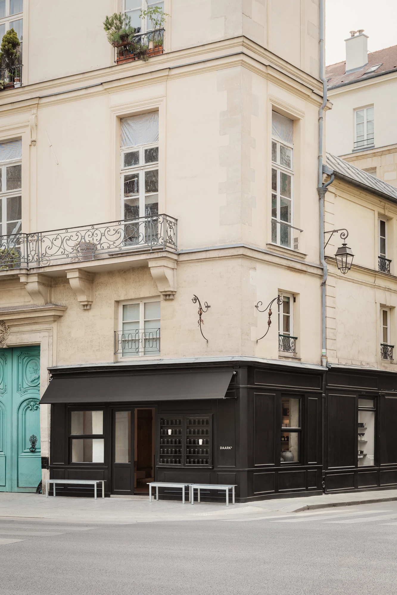 DAARK by Rodaa Studio, photographed by Adrien Ozouf — DAARK coffee shop by Rodaa Studio seen from the corner of rue de Turenne, Paris.