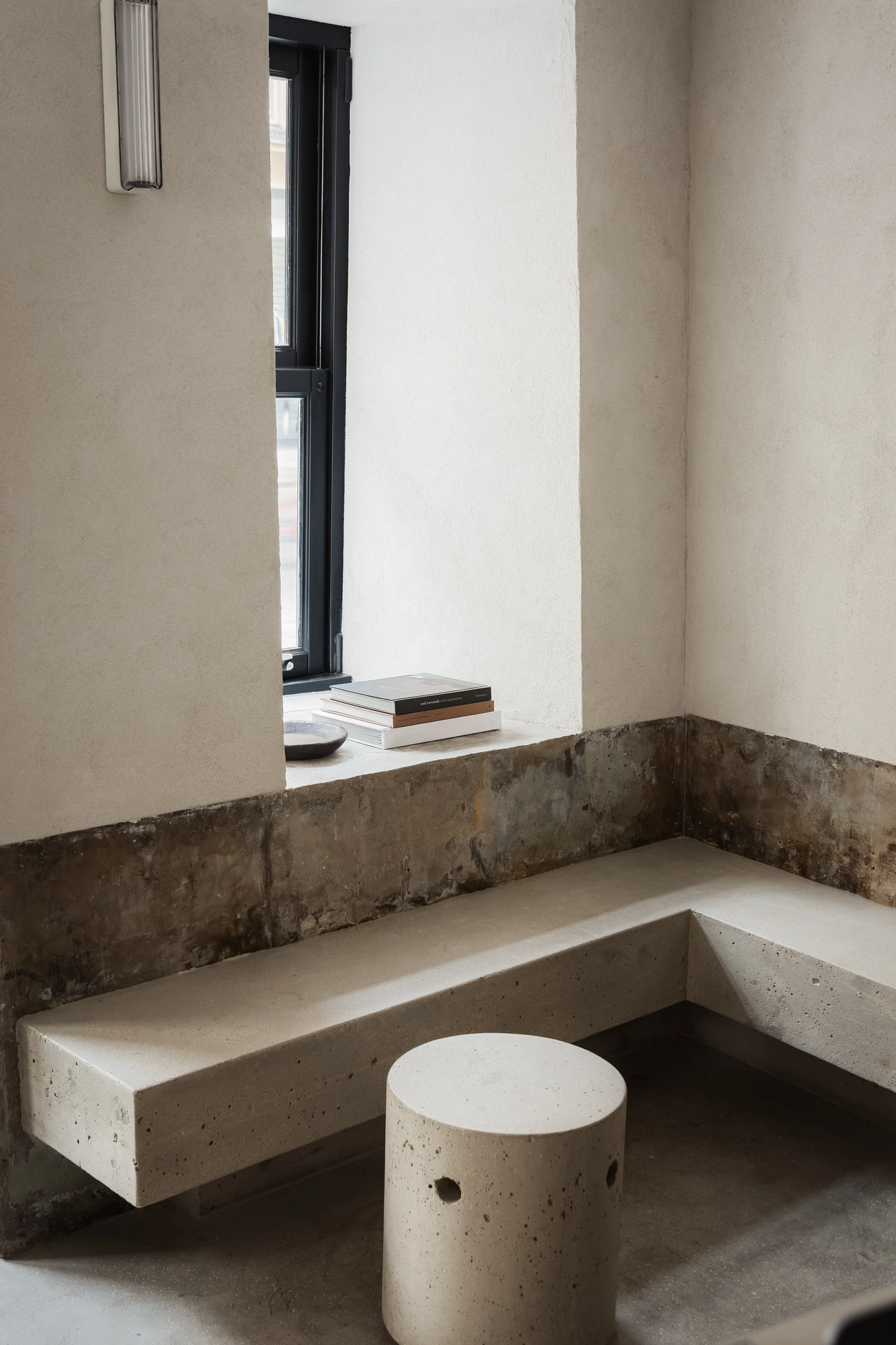 DAARK by Rodaa Studio, photographed by Adrien Ozouf — A wall shelf with cups inside DAARK by Rodaa Studio, rue de Turenne, Paris.