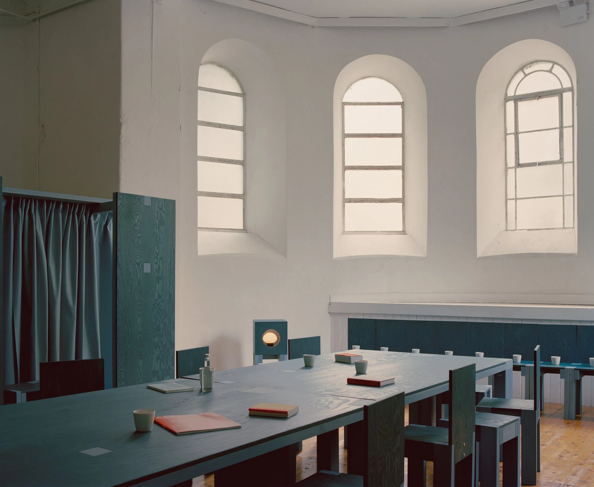 settle by Trestle, photographed by Willem Pab — settle by Trestle, Cork City, 2026, the installation seen across the room.