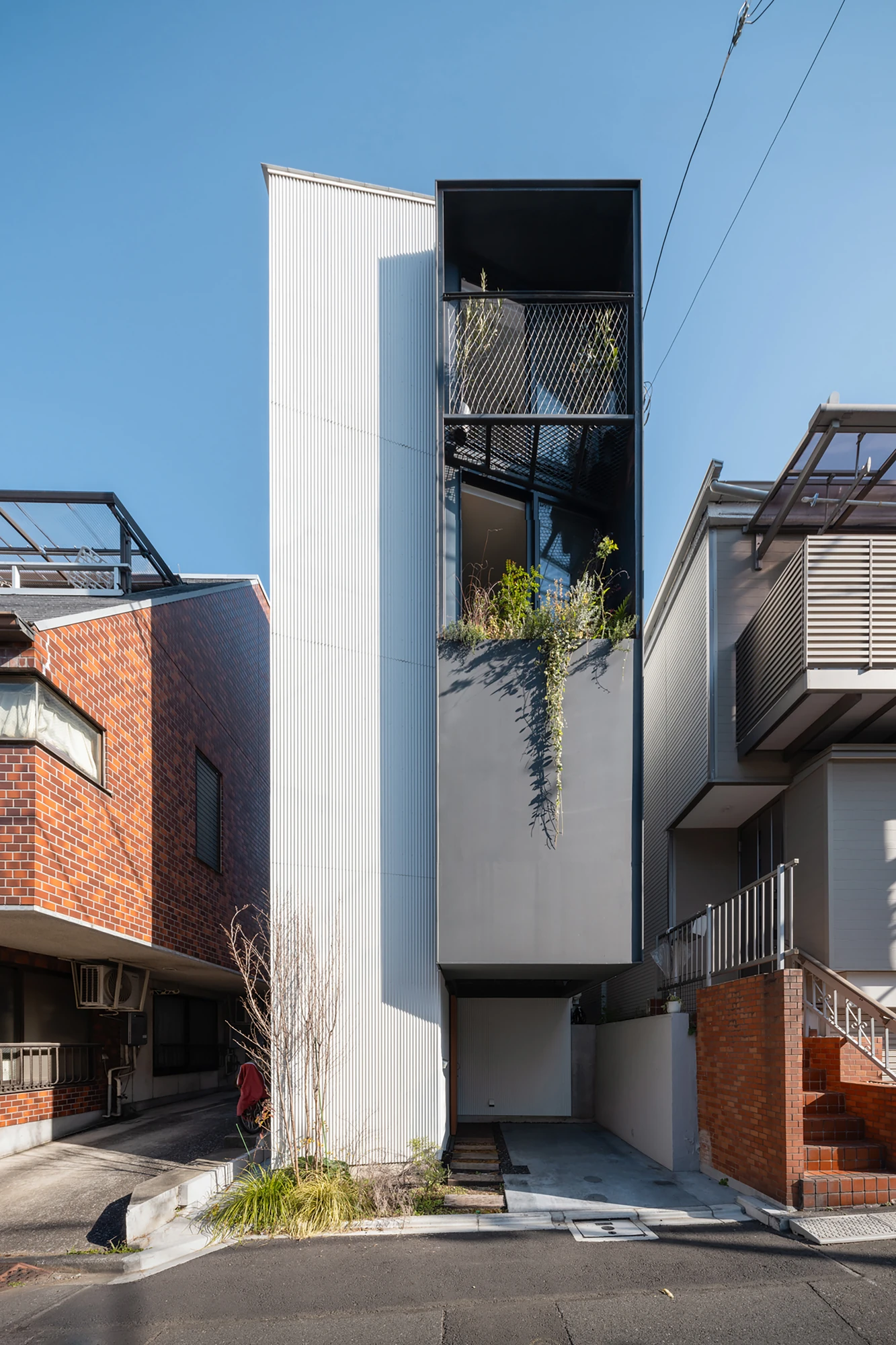 House in Kagurazaka by Takumi Wakui + Riho Wakui Architects