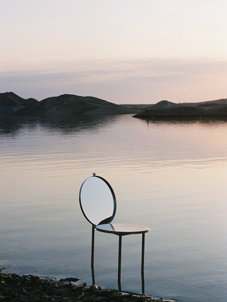 The Woman's Chair by Shushana Khachatrian — Yerevan, Armenia: a mirrored backrest that hands the sitter a reflection that keeps slipping away