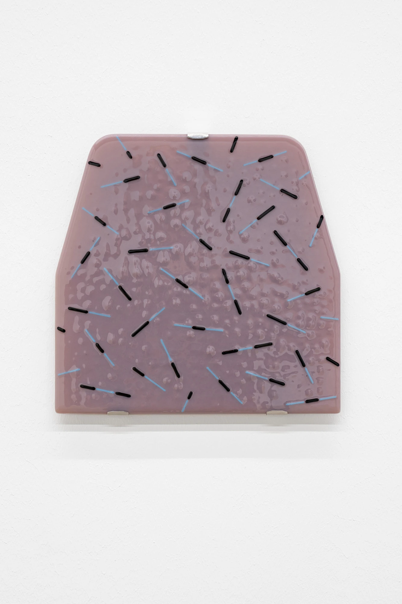 Addresses Without Names by Ju Young Kim, photographed by Dirk Tacke — She thought the bread in the plastic bag looked sad, 2026, a mauve fused-glass panel shaped like a headrest and scattered with short black and blue dashes, 29.5 x 30 x 1.2 cm.