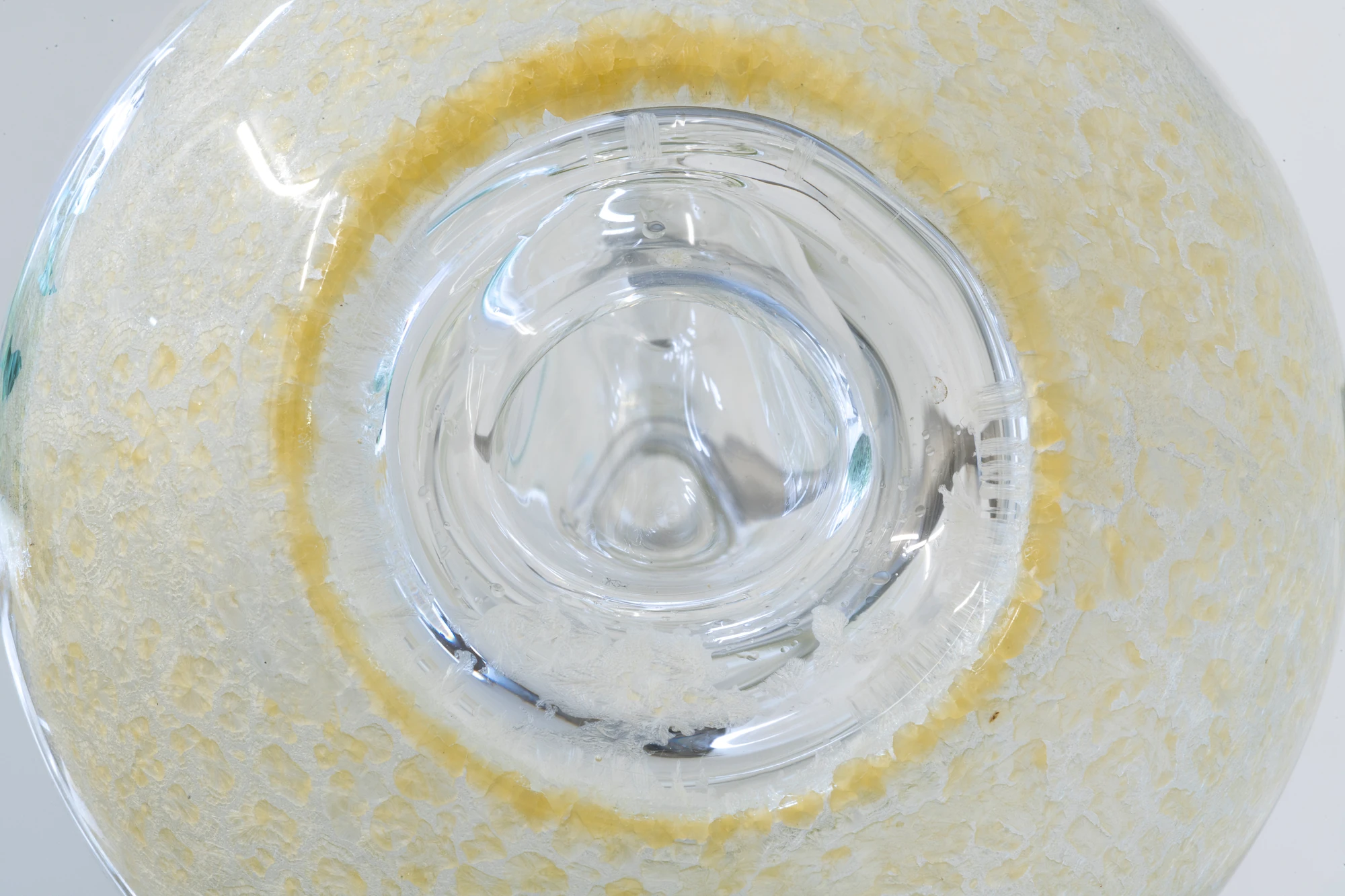 Half-Life of Grace by Jeremy Shaw, photographed by Stefan Korte — A detail of one of the three glass works, looking into a borosilicate chamber that holds a ring of residue.
