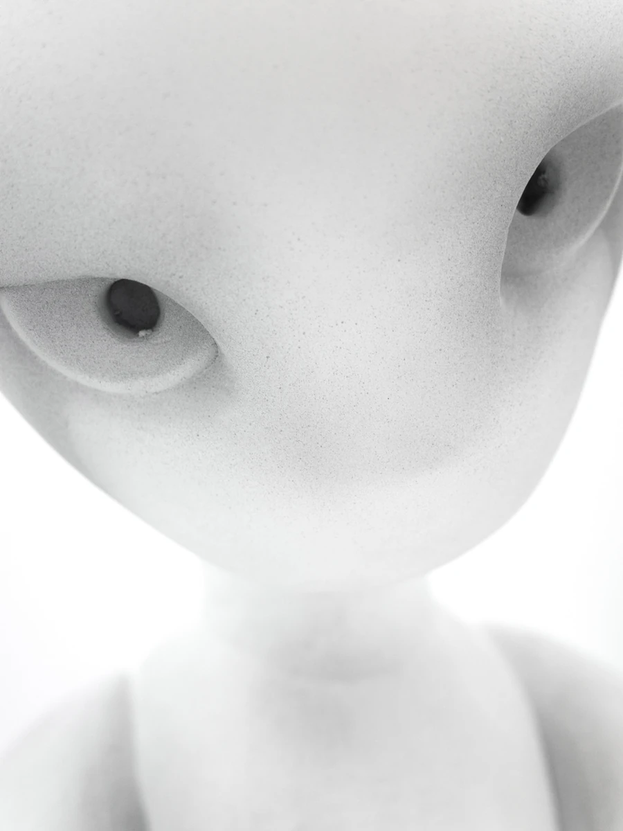 Eureka by Koesy — A close view of the standing figure's face seen from below.