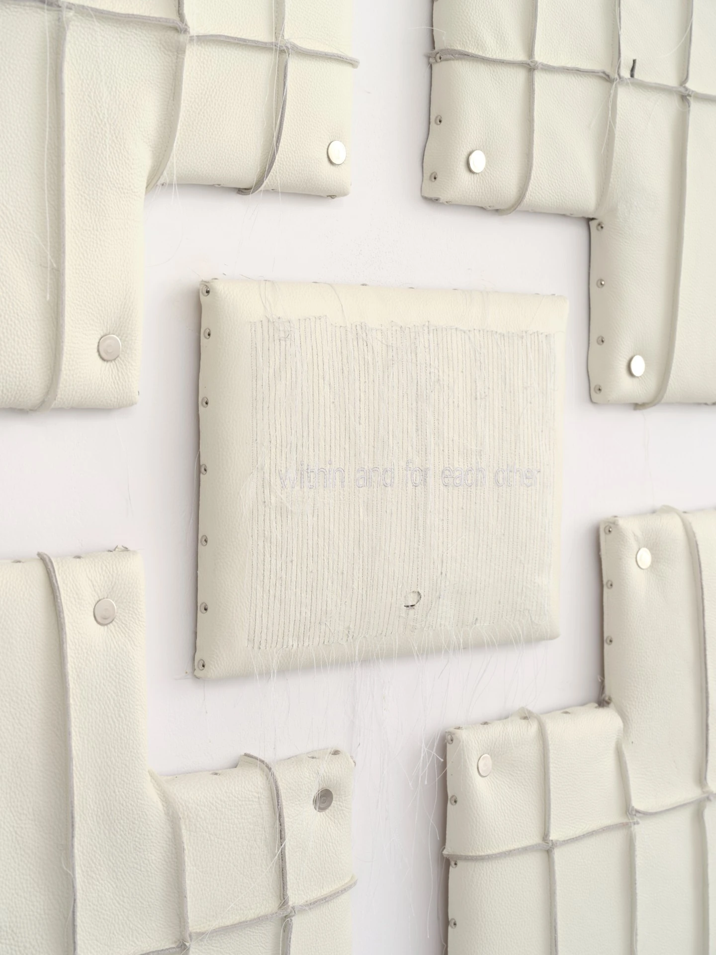 Within and For Each Other by Jan Baszak, photographed by Bartosz Górka — Detail of Relief 03 with its smaller central panel.