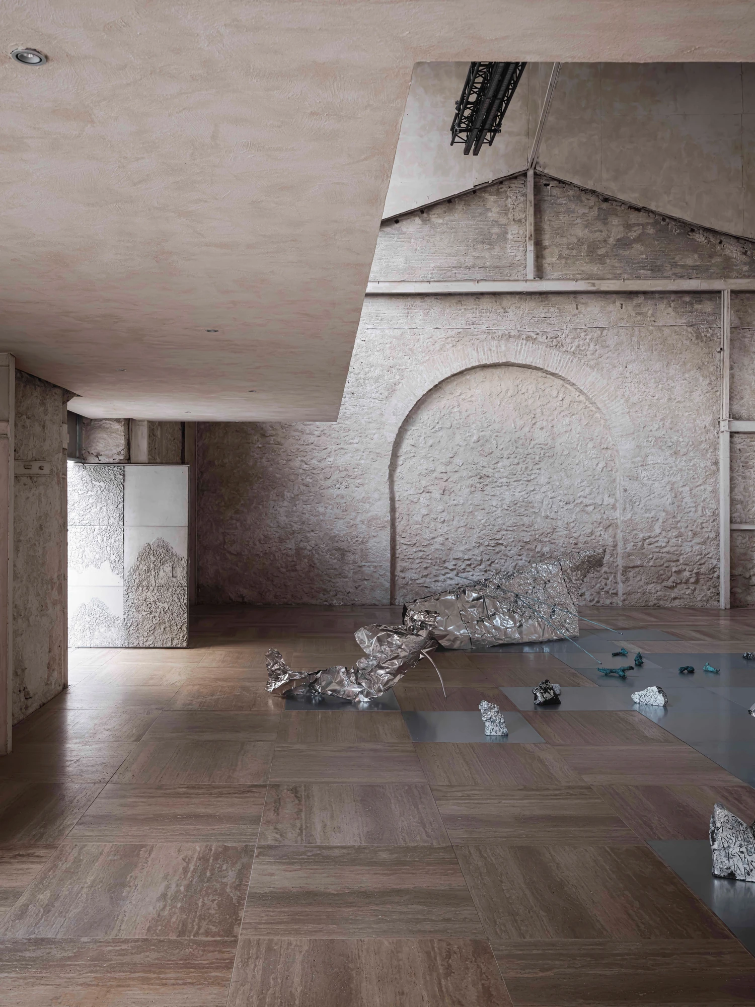 Castor Place by MPNYC, photographed by Yiorgos Kaplanidis — Installation view of Casting Water by Stefania Strouza, aluminium works spread across the hall floor