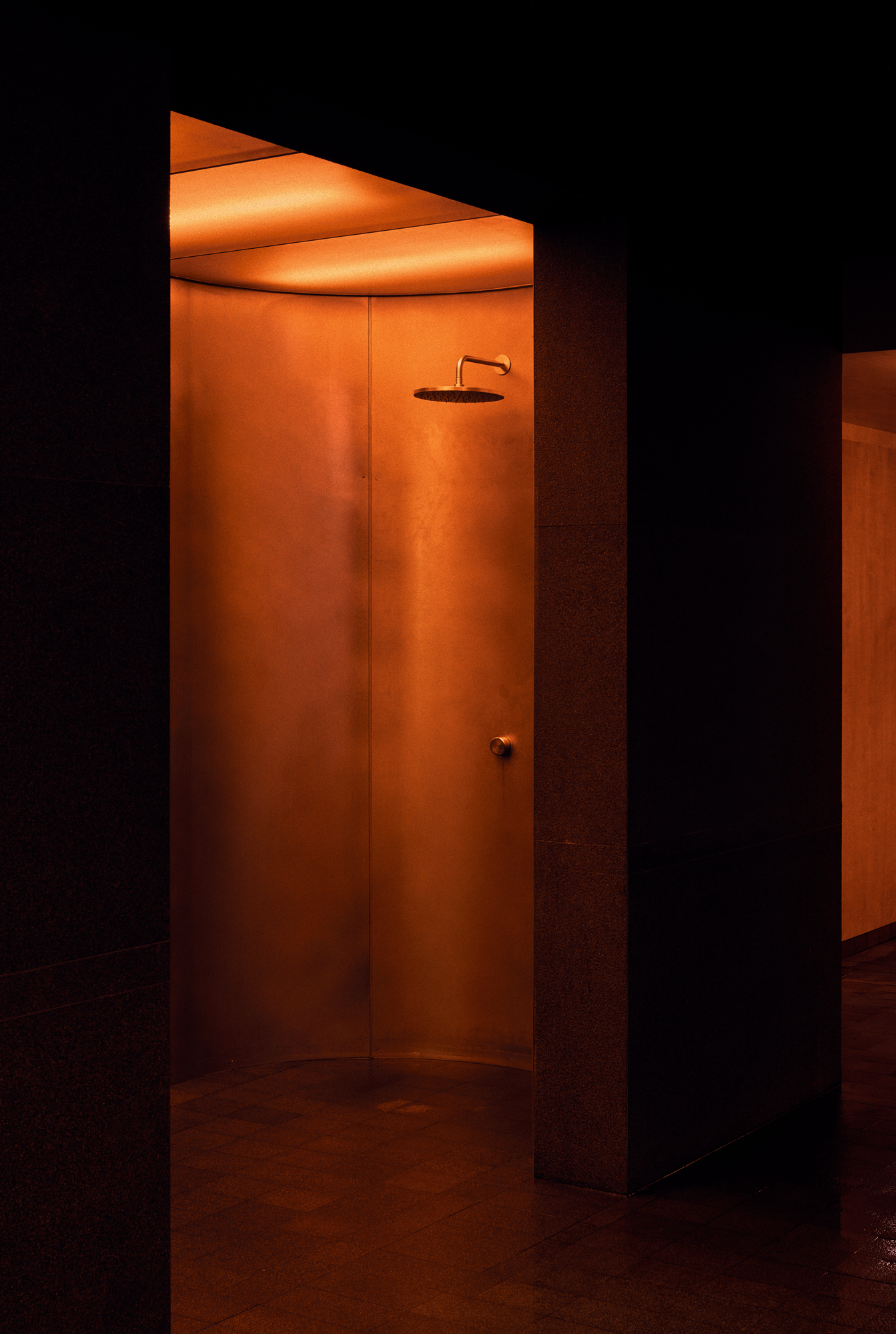 The Altar by MV-LLC — A shower lit from above through backlit fiberglass panels.