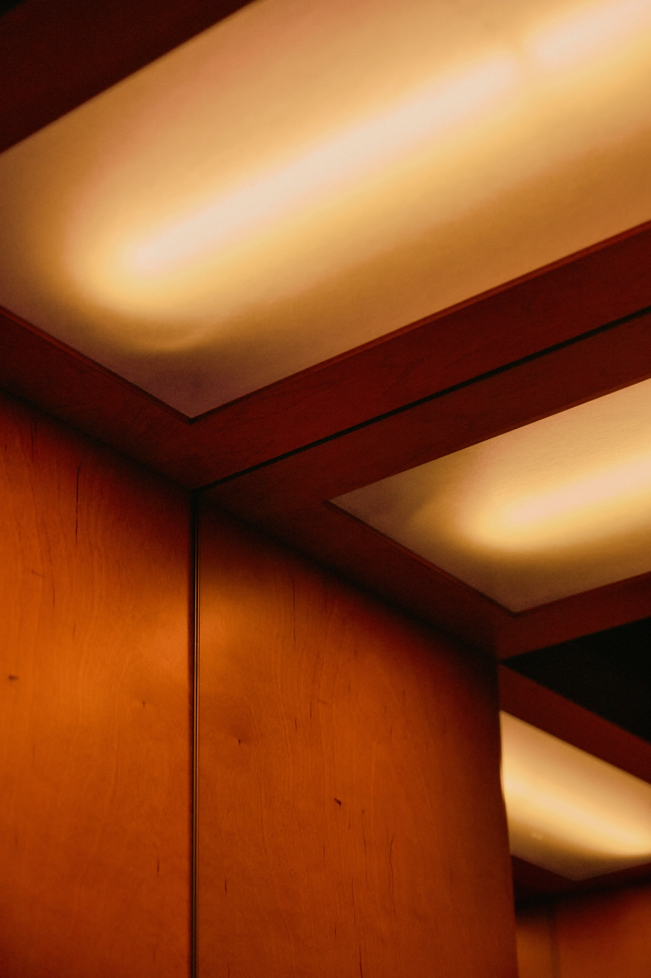 The Altar by MV-LLC — Light sources filtered through tan-colored FRP panels set into the ceiling.