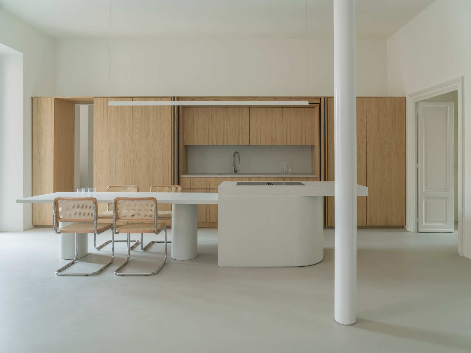 House with a White Column by SET Architects