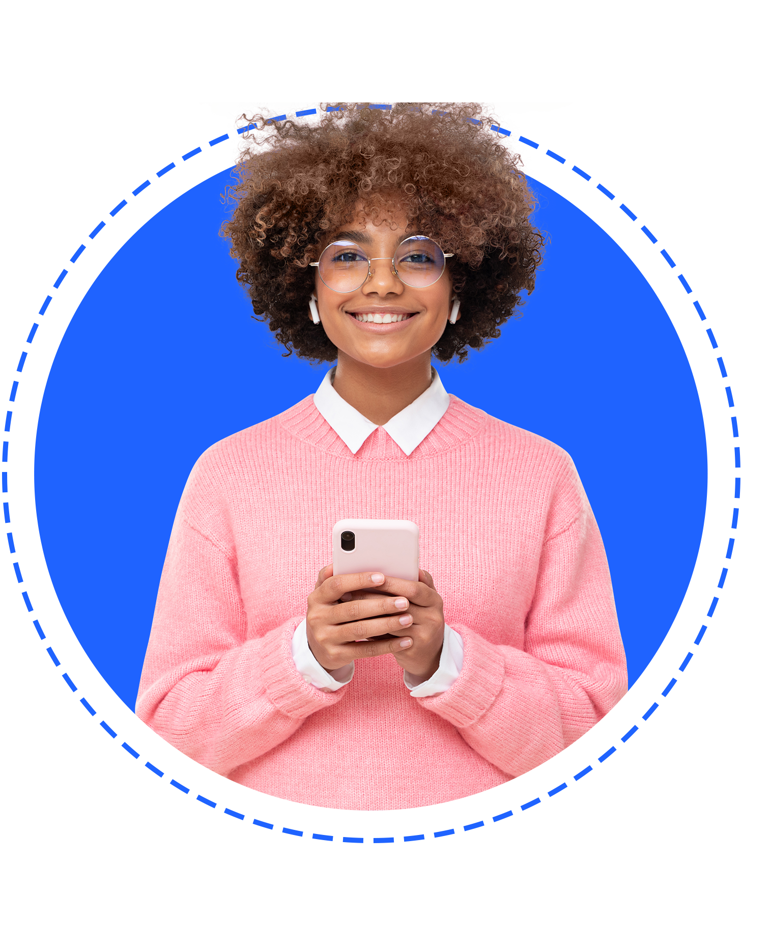 A girl smiling while holding a phone. 