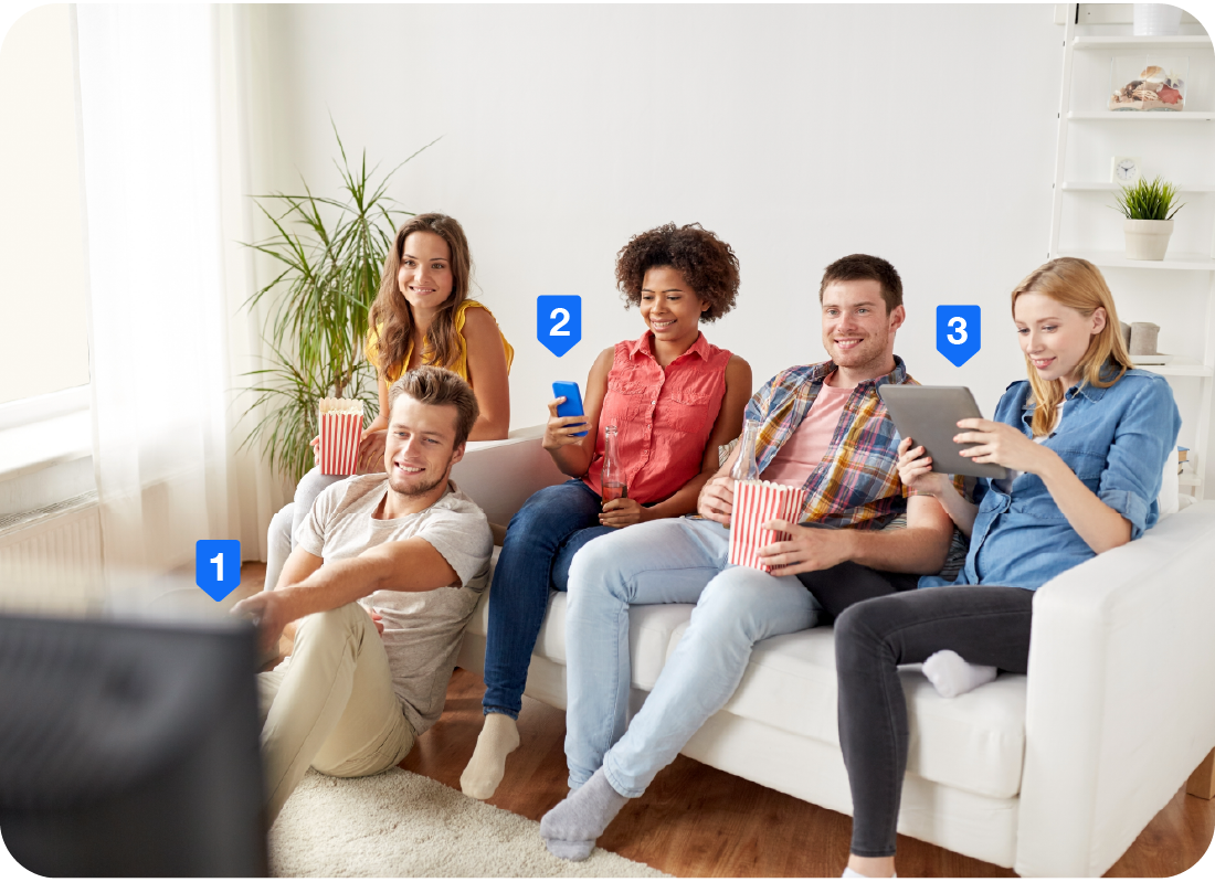 A group of people watching tv