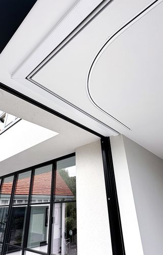 Blindspace roller blinds fitted to corner windows – Concealed blinds for corner windows