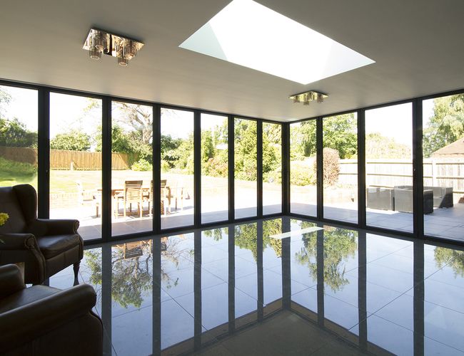 Blindspace roller blinds fitted to corner windows – Flush-mounted corner window blinds