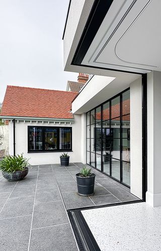 Blindspace roller blinds fitted to corner windows – Tailored corner window solutions