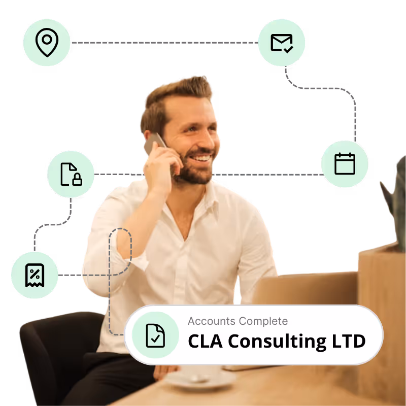 London business consultant speaking to their accountant with floating icons behind them to show company accounts filing process being completed