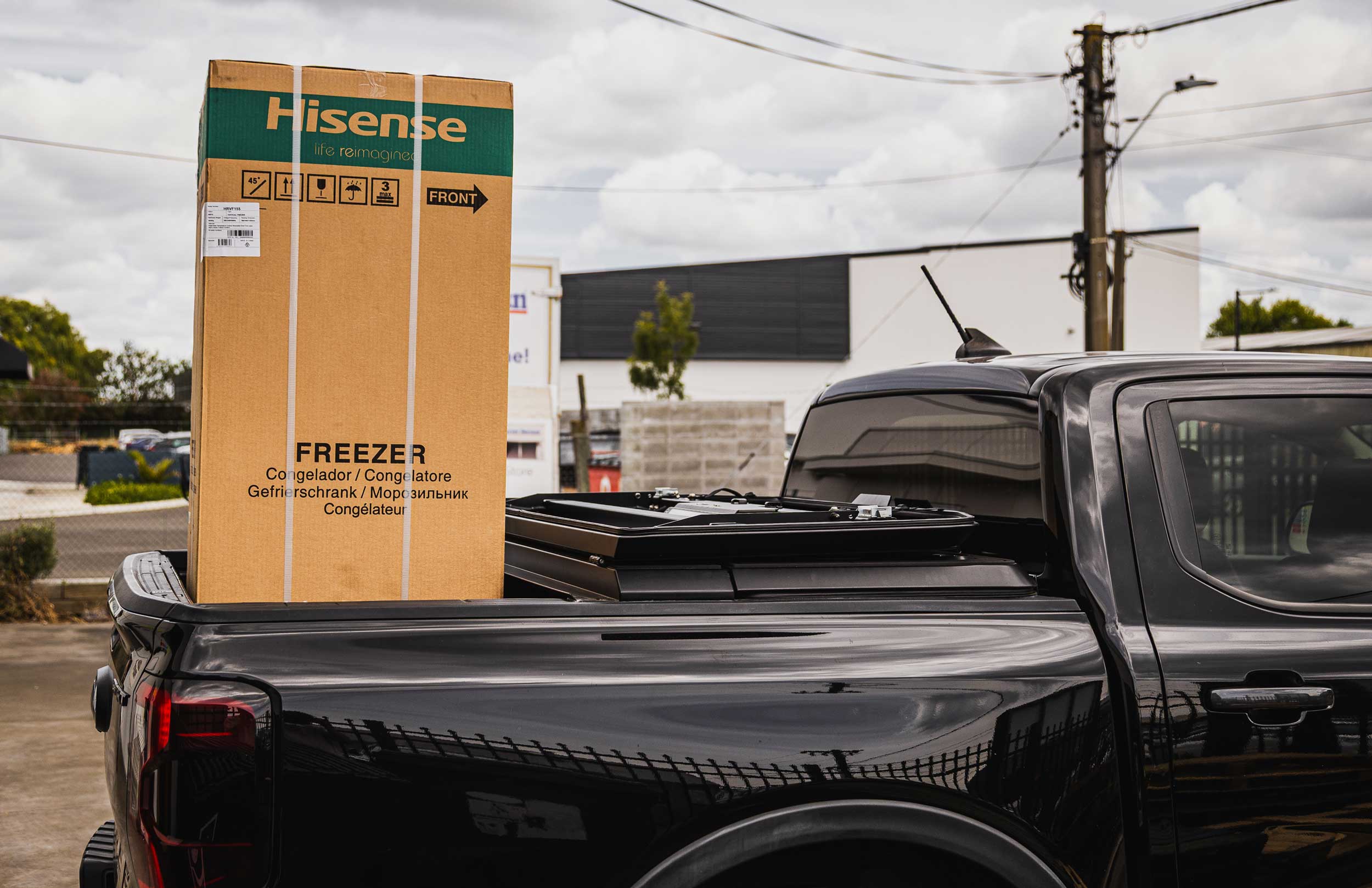 Artemis Hard Lid folded back to carry fridge.