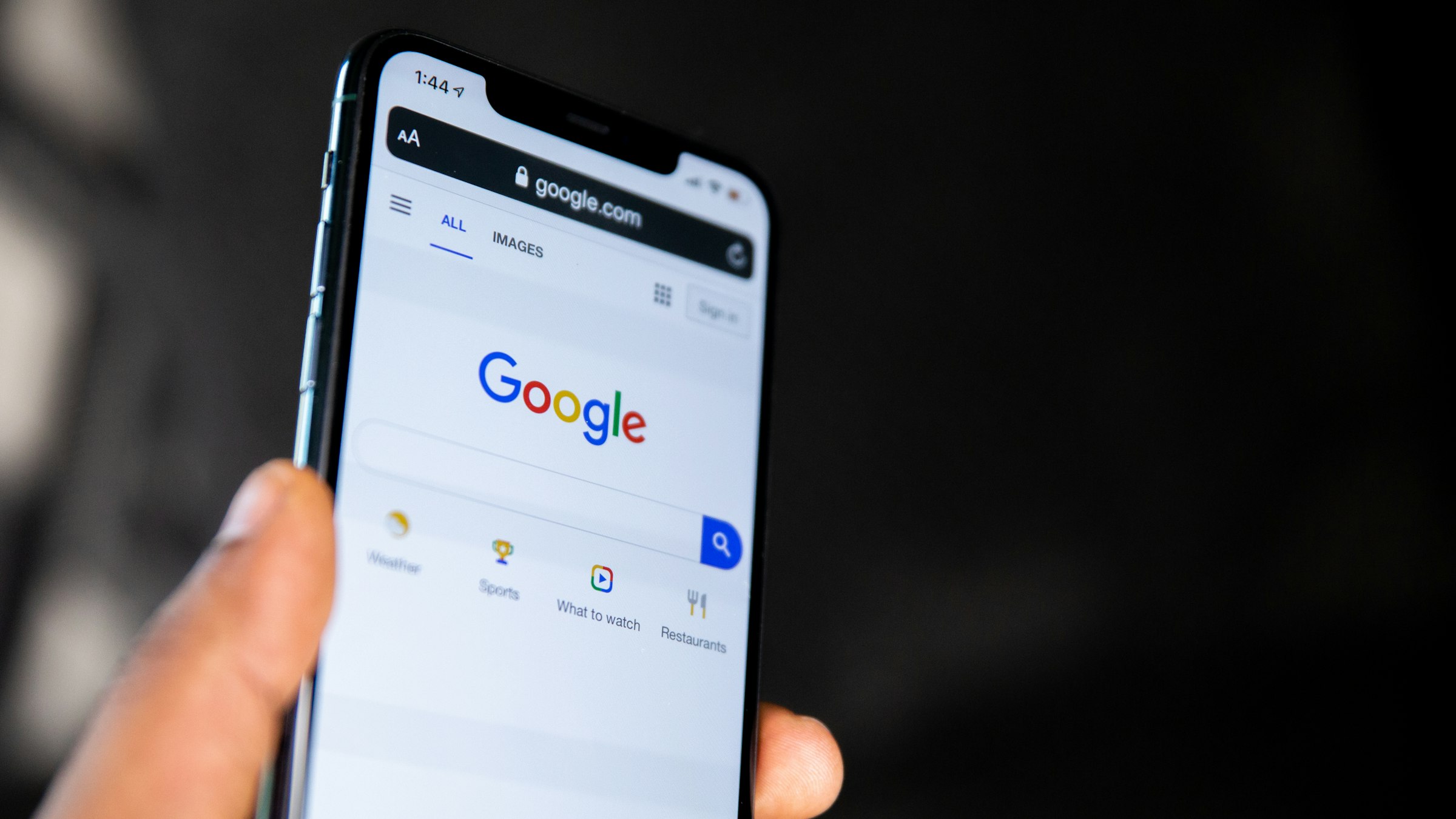 A smartphone showing the Google search page