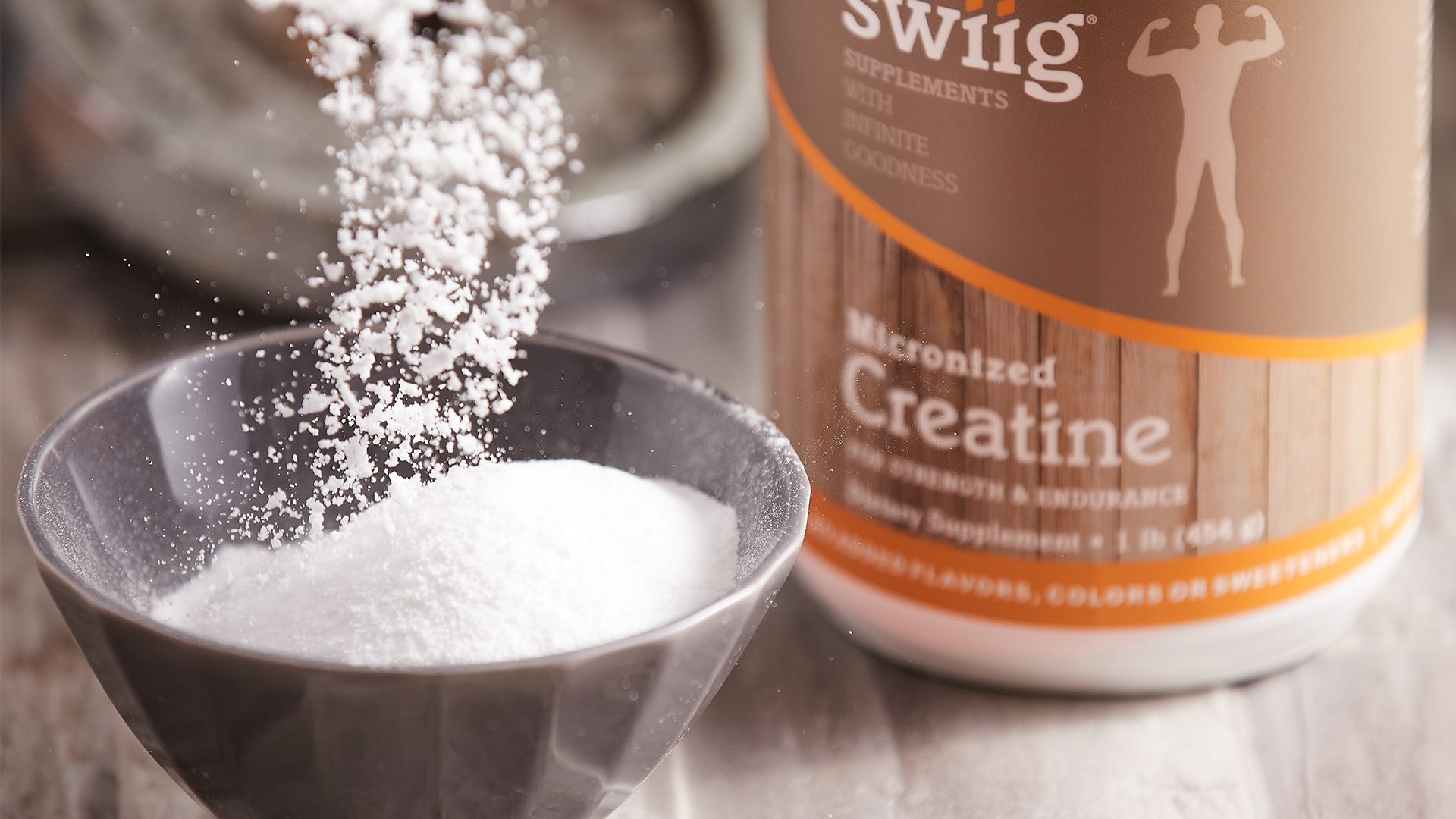 swiig creatine being poured into a bowl