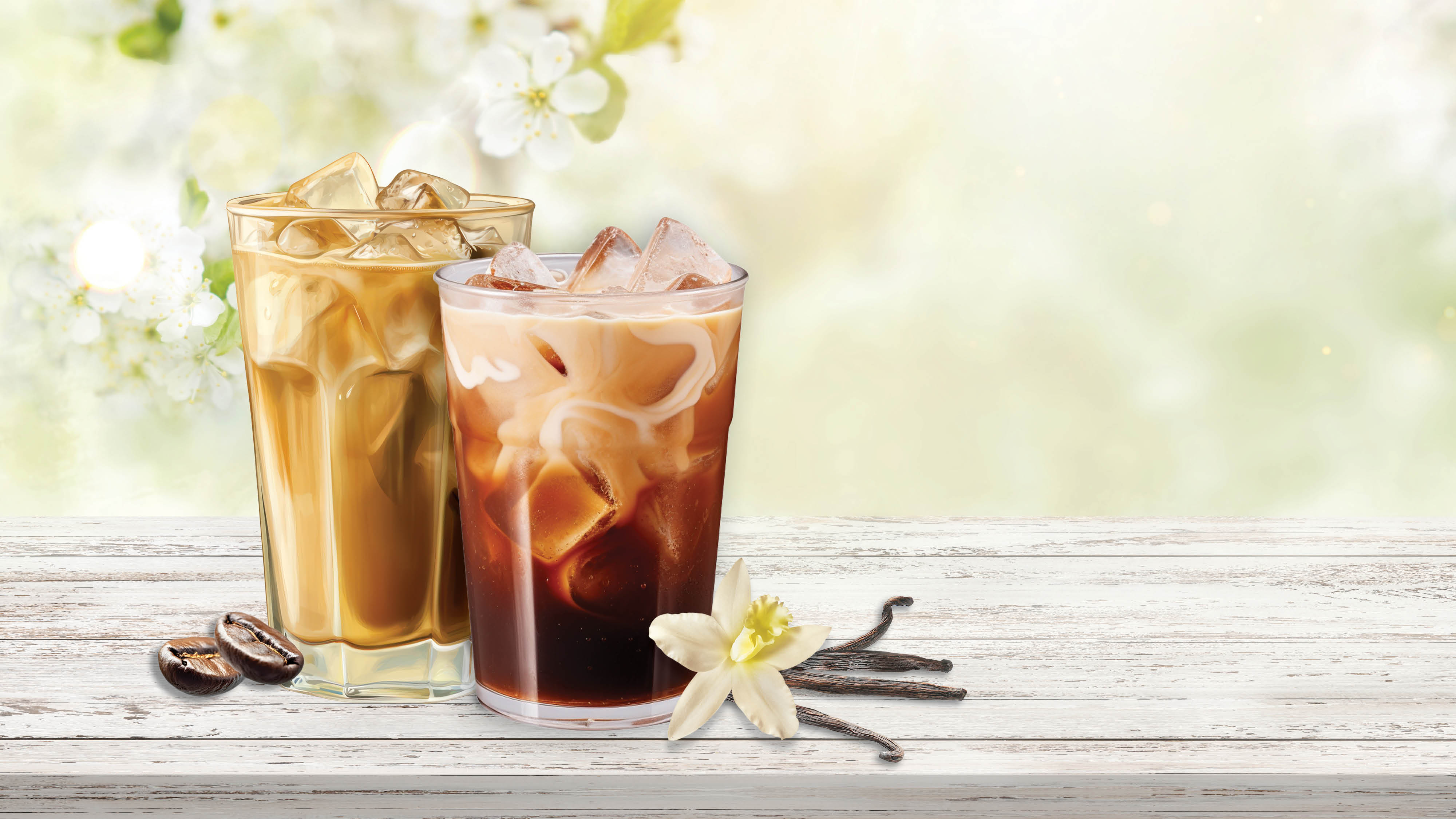 Iced protein cold brew coffee on a grey wooden table with a white cherry blossom tree background