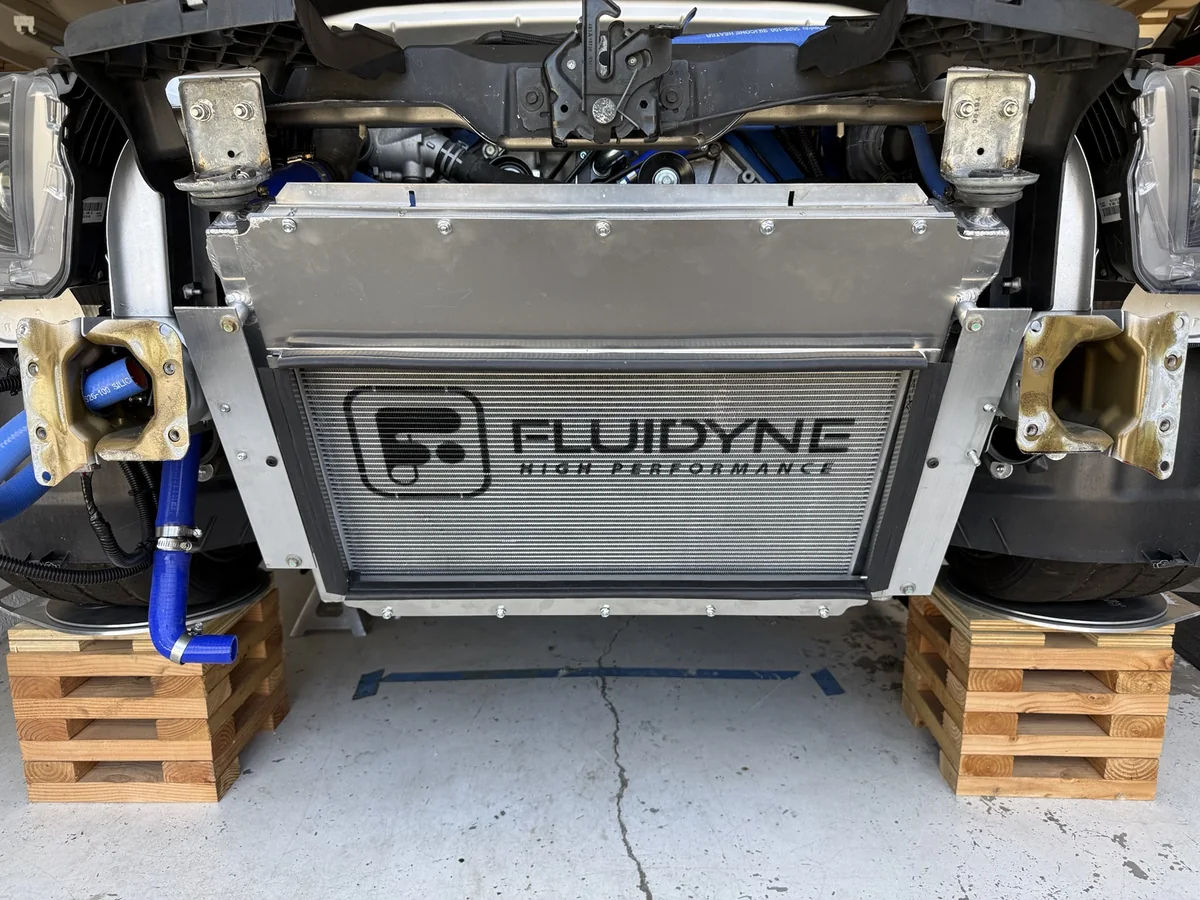 FLUIDYNE radiator with aluminum blockoff panels and perimeter sealing trim; the VMP heat exchanger is removed.