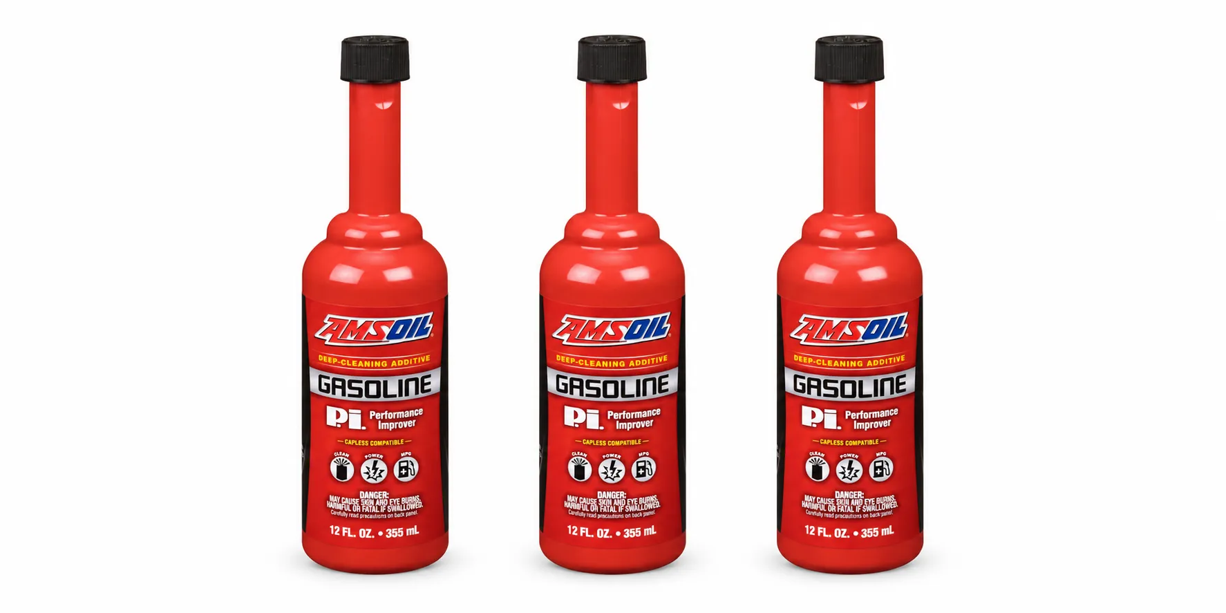 Three AMSOIL P.i. Performance Improver gasoline additive bottles on a white background