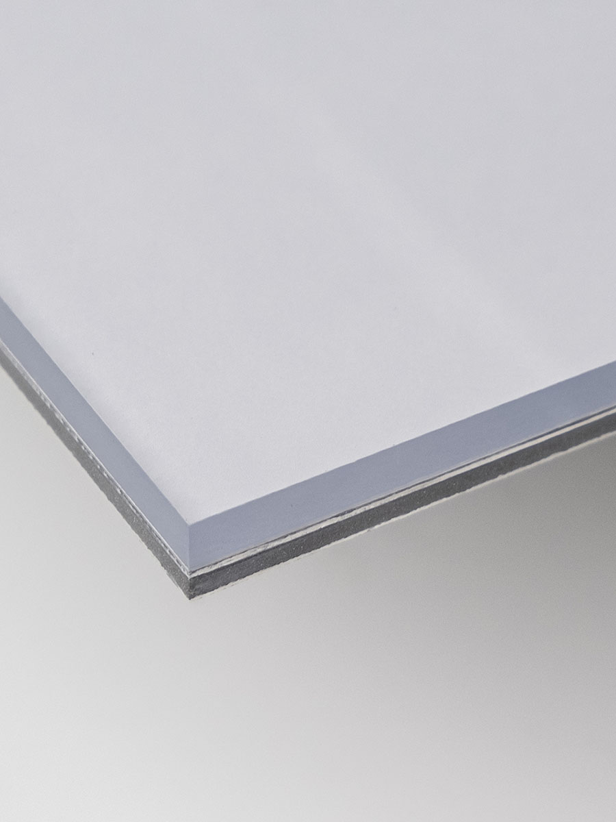 Close-up of the polished 1/4-inch acrylic edge and backing of an acrylic print