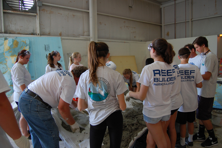 Kids helping build Reef Cells reefs