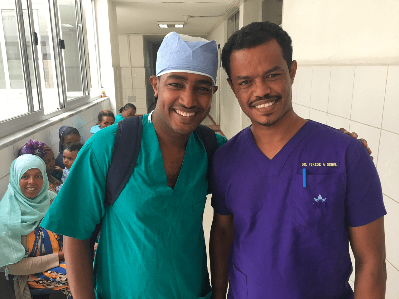 Dr. Yayu on the left