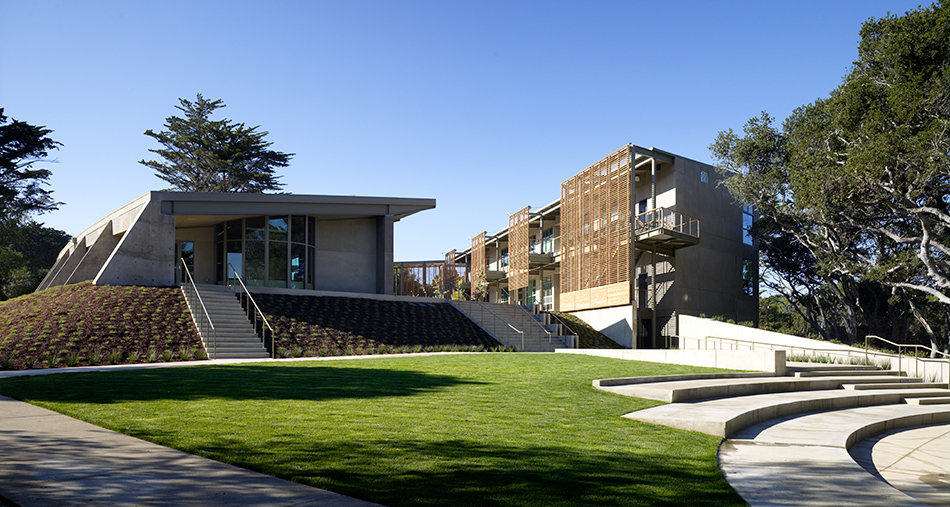 Nueva School Hillside Learning Complex & Historic Crocker Mansion, Hillsborough, CA: Education and Historic new construction and renovation by Herrero Builders earning LEED Gold, with Leddy Maytum Stacy Architects. Exterior view of a lawn, amphitheater steps and a slatted balcony building.