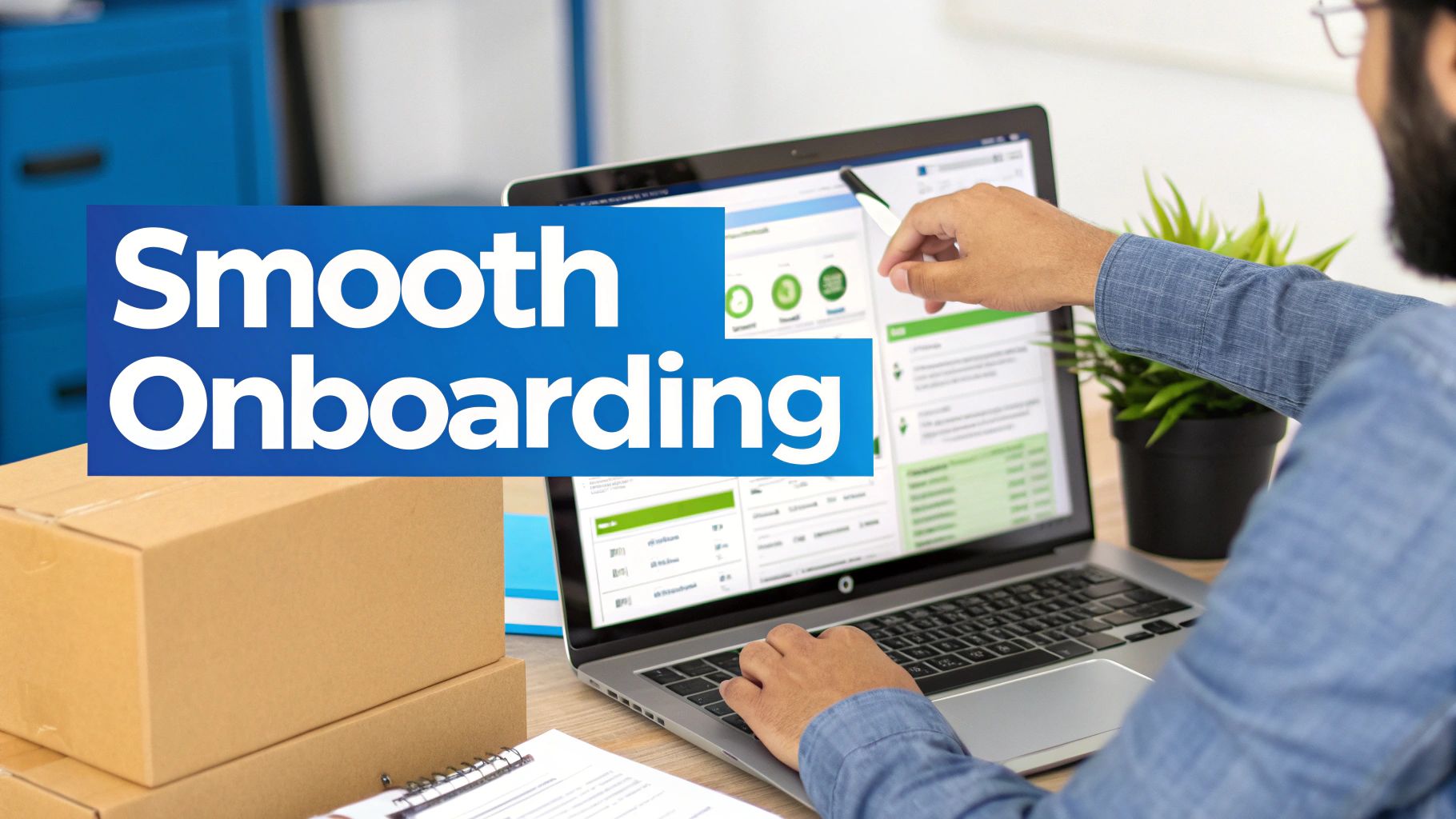 Person using a laptop and stylus for smooth onboarding processes, with cardboard boxes.