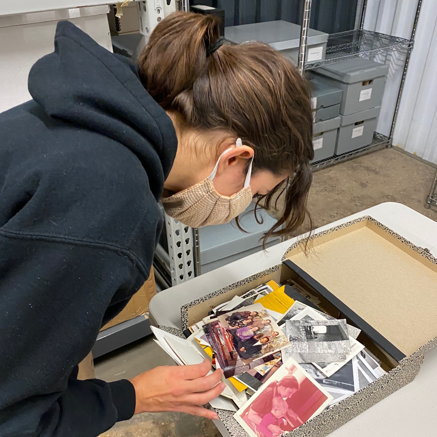 Archives intern Molly McBride Jacobson digs into unsorted family photographs from our archives