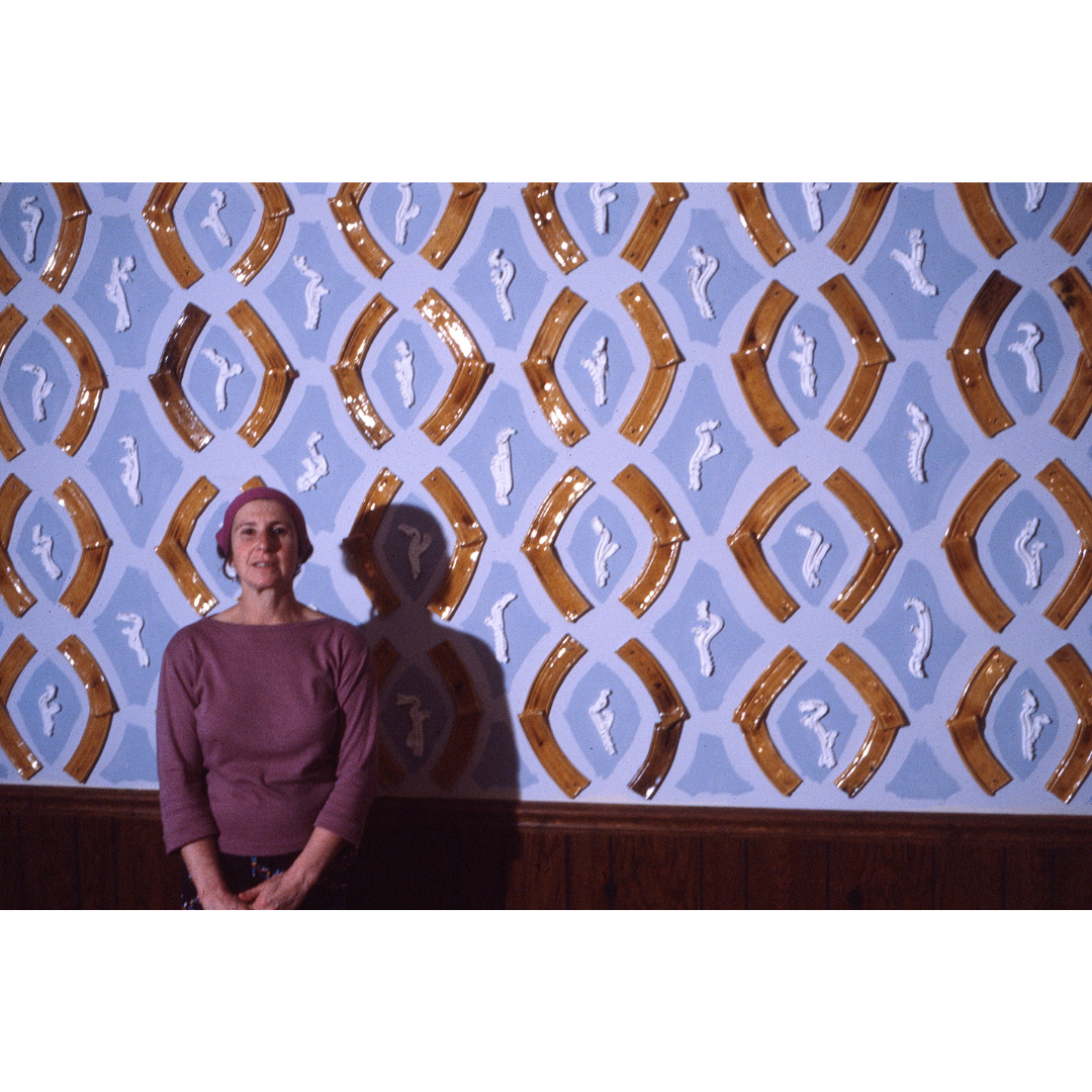 L to R: 1-3, 5, 6: Installation views, “An Interior Exchanged,” Fashion Institute of Technology, New York, New York, 1982. Woodman Family Foundation Archives | 4: Spread from “Wallpapers for Historic Buildings” by Richard C. Nylander, The Preservation Press, Washington, D.C., 1983 | 7: Betty Woodman, “Cloistered Arbor Room,” 1981, 10 x 23 ft. Glazed earthenware, epoxy resin, lacquer, fabric. Installation view from “The Elizabeth Reed Keller Memorial Exhibition: Ceramics,” Suzanne Lemberg Usdan Gallery, Bennington College, Bennington, Vermont, 1981 | 8: Betty Woodman, “Bedroom with Lattice,” 2009, 92 x 85 x 15 in. Glazed earthenware, paint, canvas | 9: Spread from “Pompei ercolano stabile oplontis: le città sepolte dal Vesuvio” by Pietro Giovanni Guzzo, Electa Napoli, Italy, 2003 | 10: Betty Woodman, “Villa Oplontis,” 2006, 45 x 121 x 11 in. Terra sigillata, canvas, glazed earthenware, epoxy resin, lacquer, wood | 11: Betty Woodman, “Il Giardino Dipinto,” 1993, 9 x 35 ft. Glazed earthenware, epoxy resin, lacquer, paint. Installation view from “Betty Woodman: Il Giardino Dipinto,” Rhode Island School of Design Museum, Providence, Rhode Island, 2005 | 12: Selected books on wall paintings, wallpapers, and architecture from Betty Woodman’s collection | 13: Betty Woodman, “Wallpaper: 11,” 2016, 120 x 144 in. Glazed earthenware, epoxy resin, lacquer, acrylic paint. All Betty Woodman artworks © Woodman Family Foundation / Artists Rights Society (ARS), New York