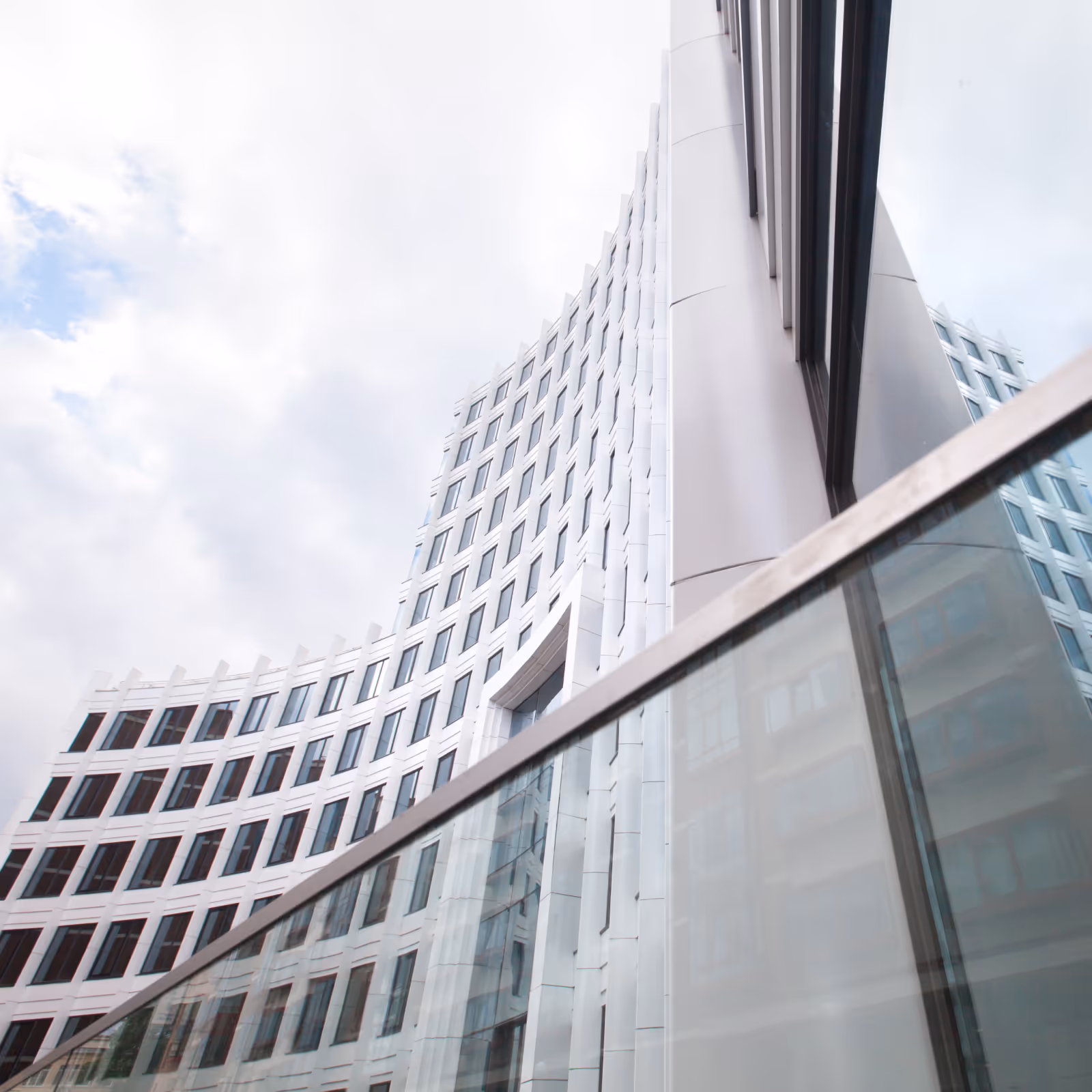 Bottom view of modern skyscrapers in the white business district