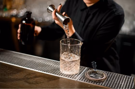 Bartender pouring a drink