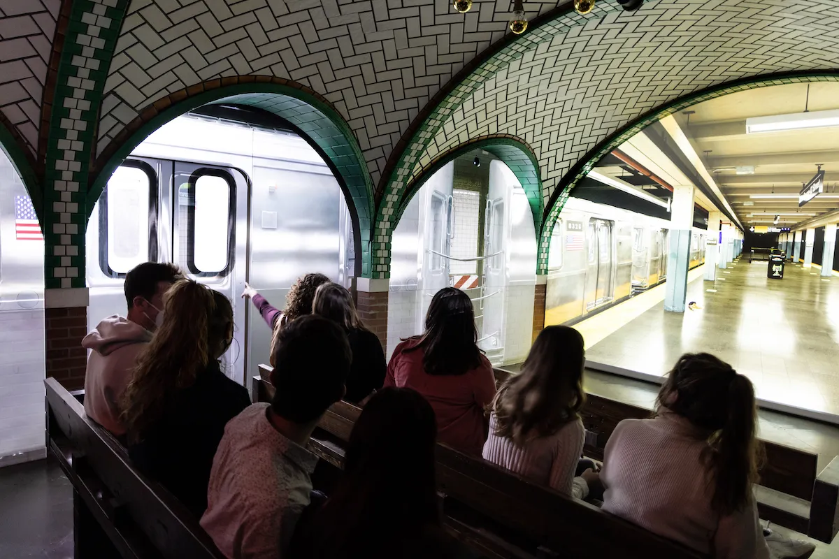 An image of people sitting inside of the RiseNY location