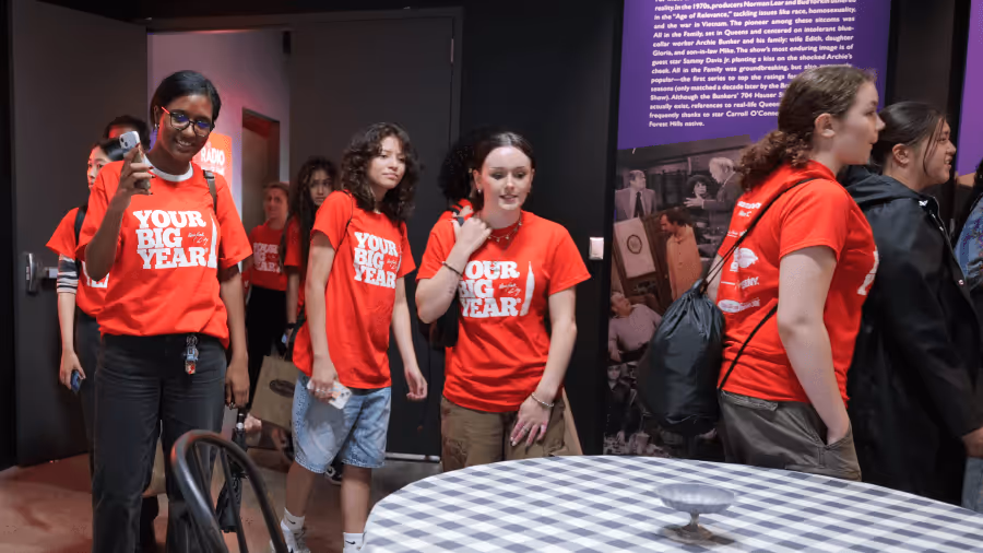 A group of students on at trip at RiseNY, enjoying the exhibits.