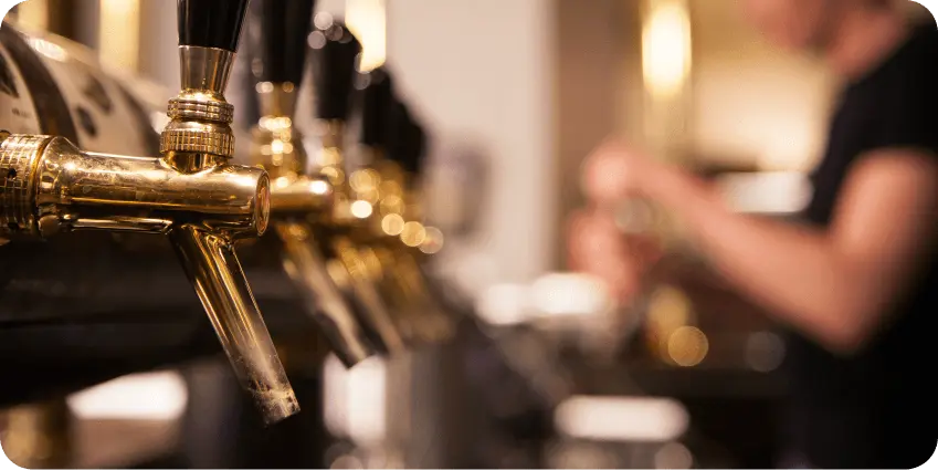 Row of brass beer taps