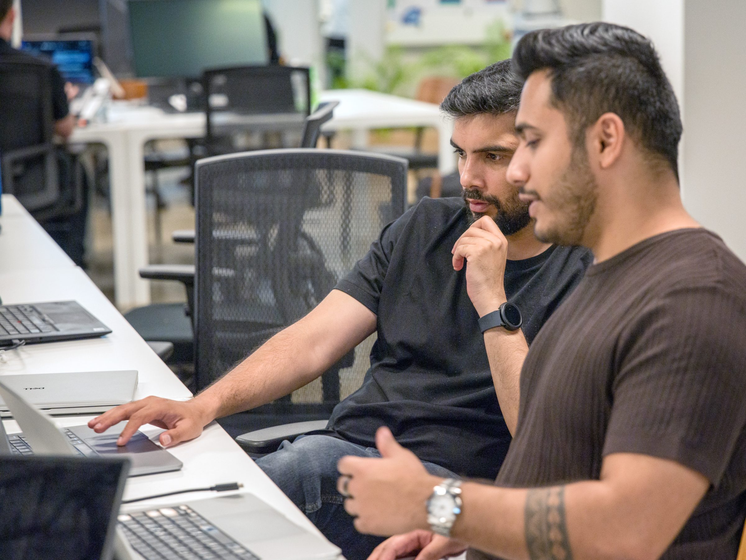 Two Fabric engineers reviewing code together
