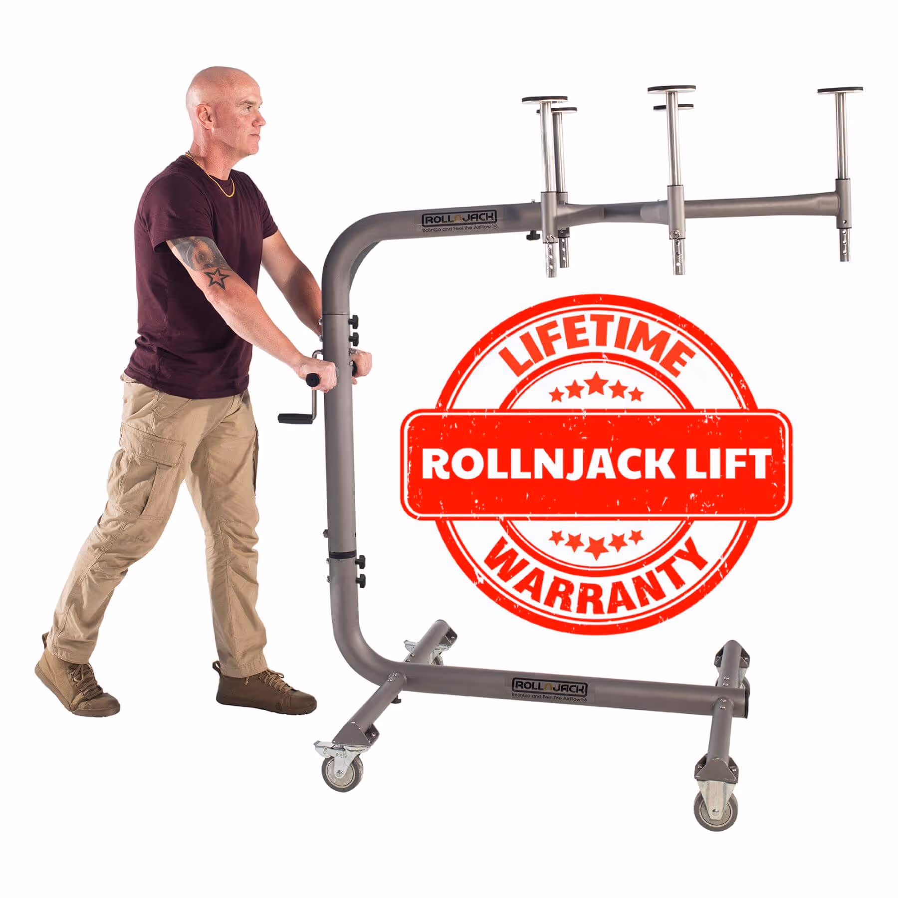 Bald man operating a gray RollnJack lift device with wheels on a white background, featuring a red stamp graphic reading 'Lifetime RollnJack Lift Warranty'.