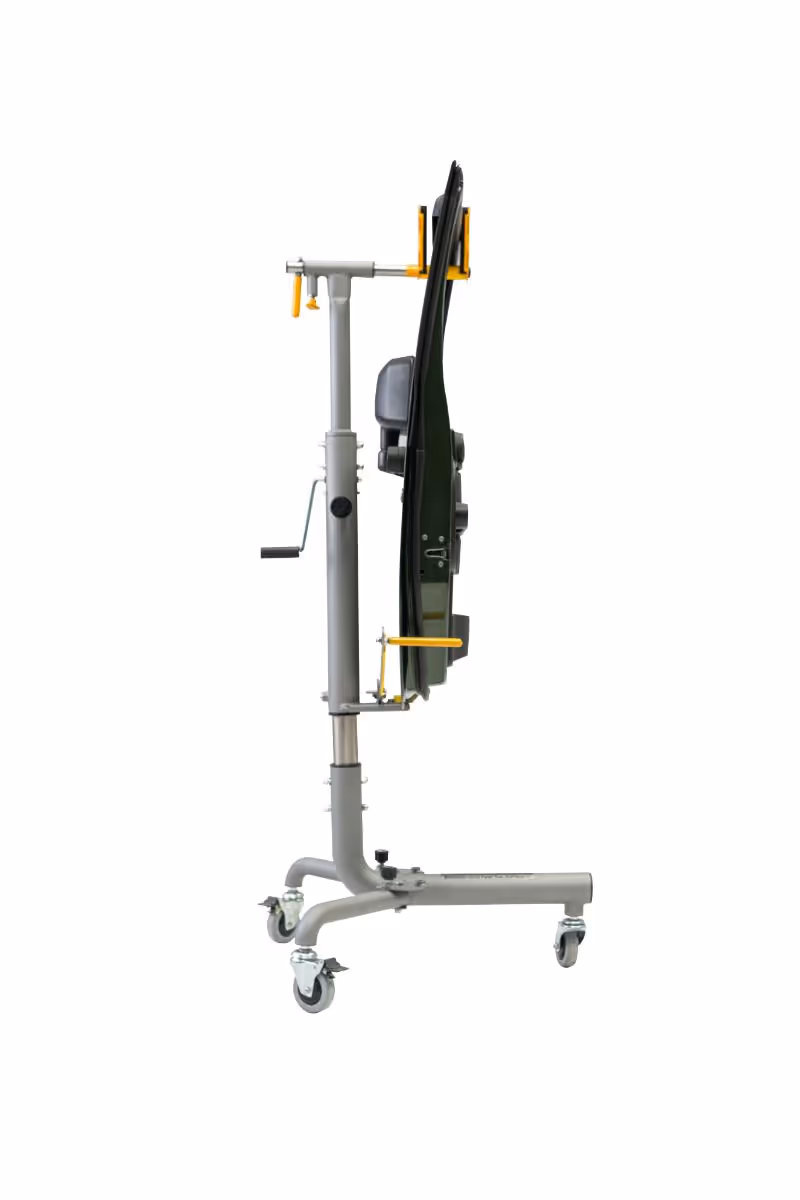 Side view of a foldable wheelchair lift with a metal frame and four caster wheels on a white background.