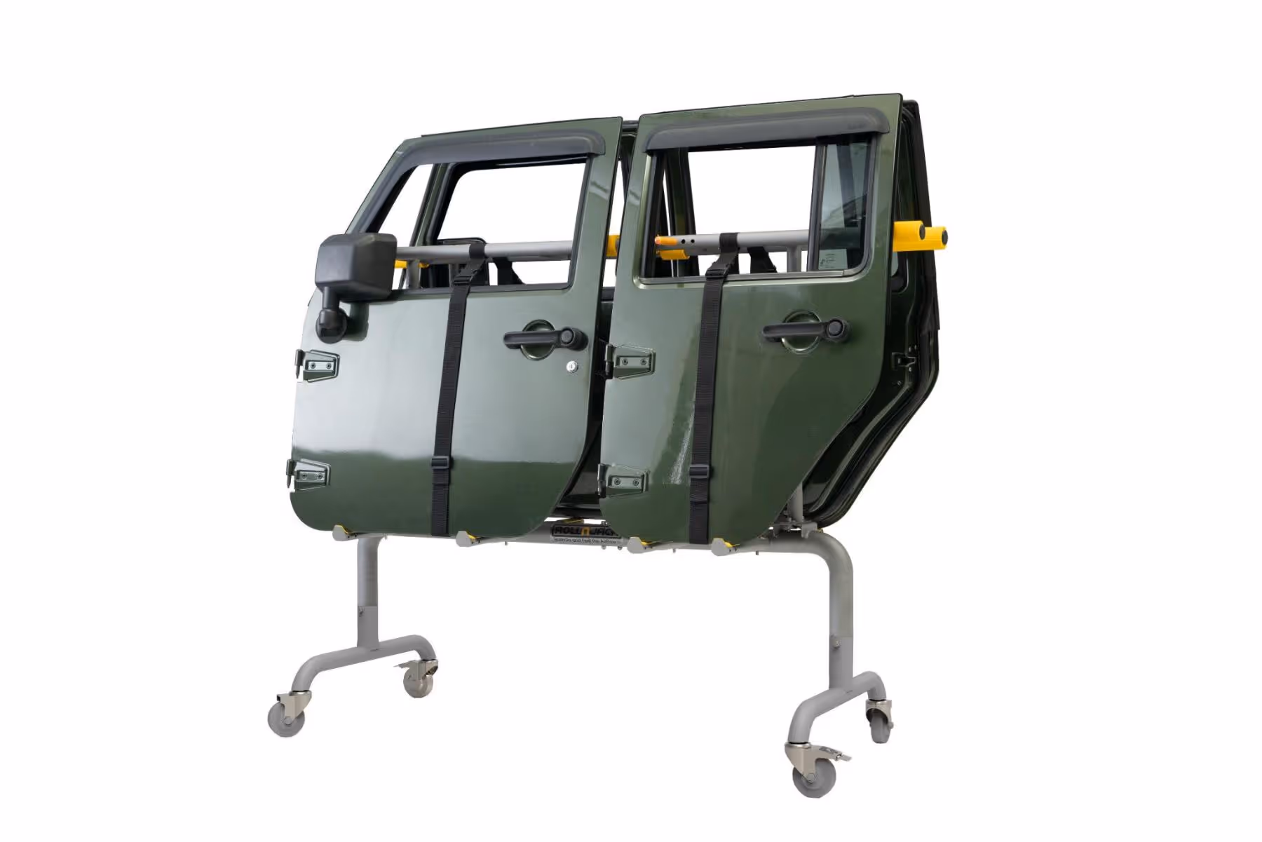 Green vehicle doors mounted on a mobile metal stand with wheels.