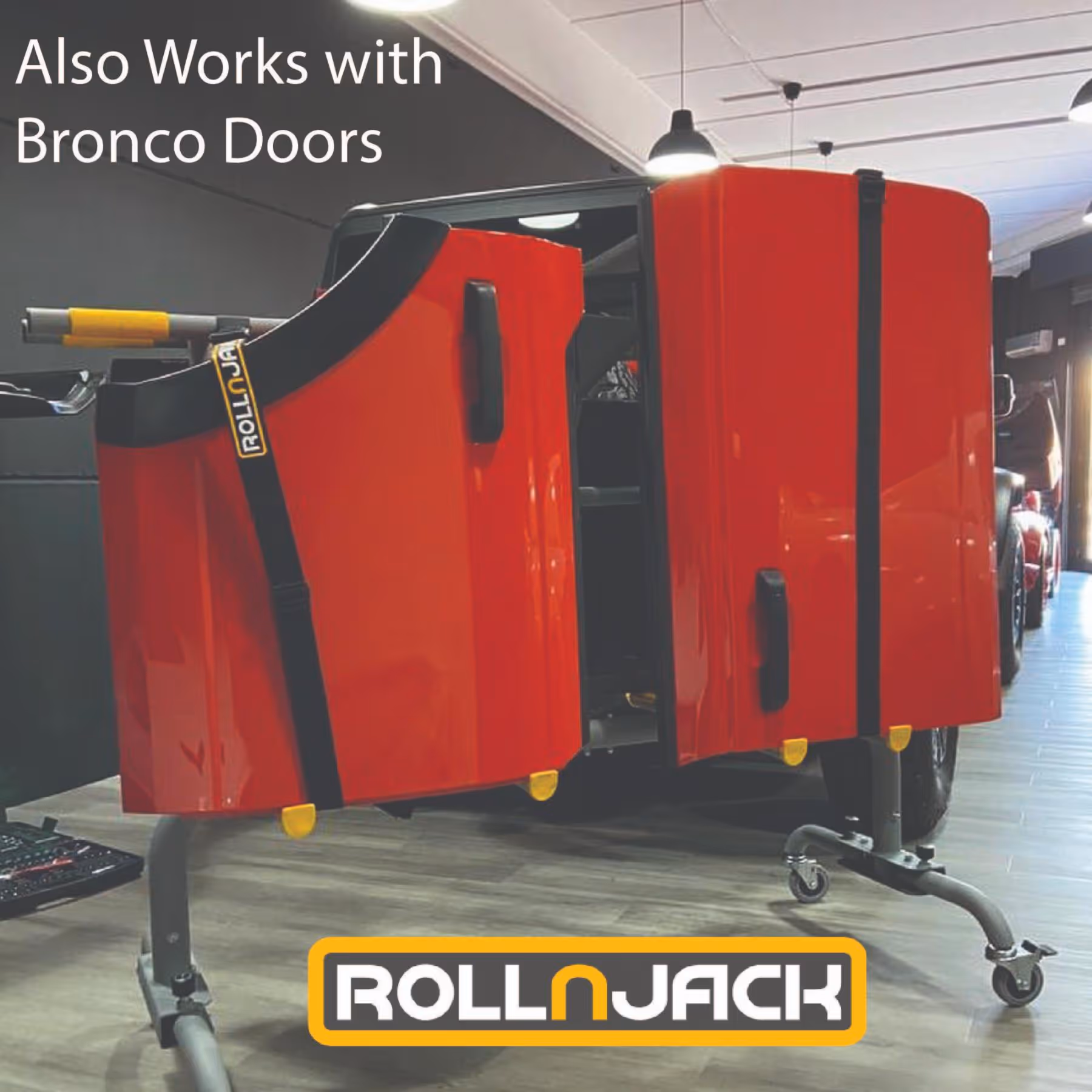 Red RollnJack protective doors mounted on a vehicle, shown open with text 'Also Works with Bronco Doors'.