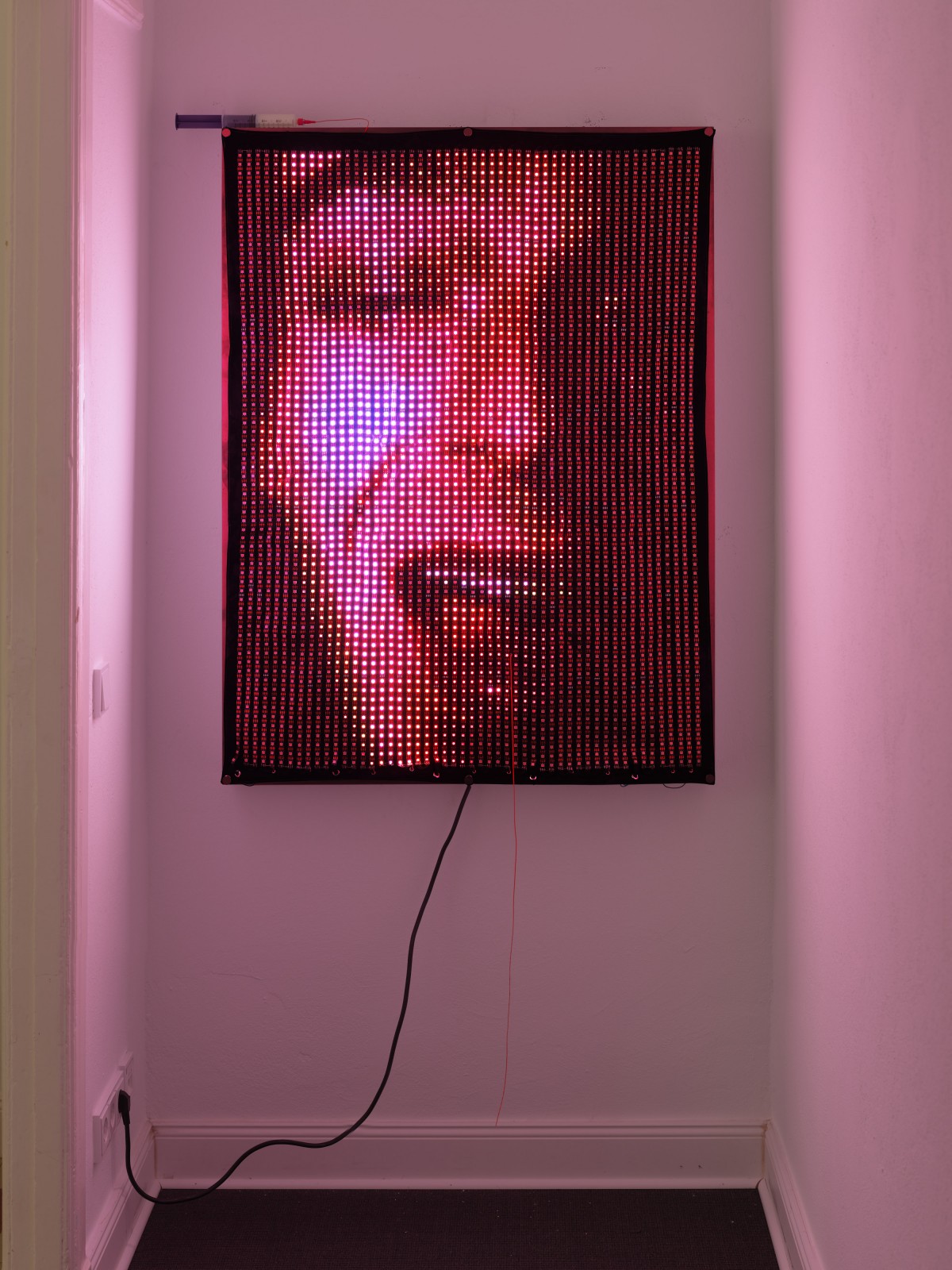 Ei Arakawa-Nash, Jürgen Klauke, Dr. Müllers Sex-Shop oder so stell' ich mir die Liebe vor, 1977 (detail), 2025, 3,588 LEDs (WS2813, 60 LEDs/m, black) on hand-dyed fabric with grommets and eyelets, K8000C controller, 2GB SD card with LedEdit 2014 files, 5 x 5V 80A power supply with 22 AWG stranded wire, custom aluminum case, 122 x 91 x 9 cm. All photos: Eric Tschernow.