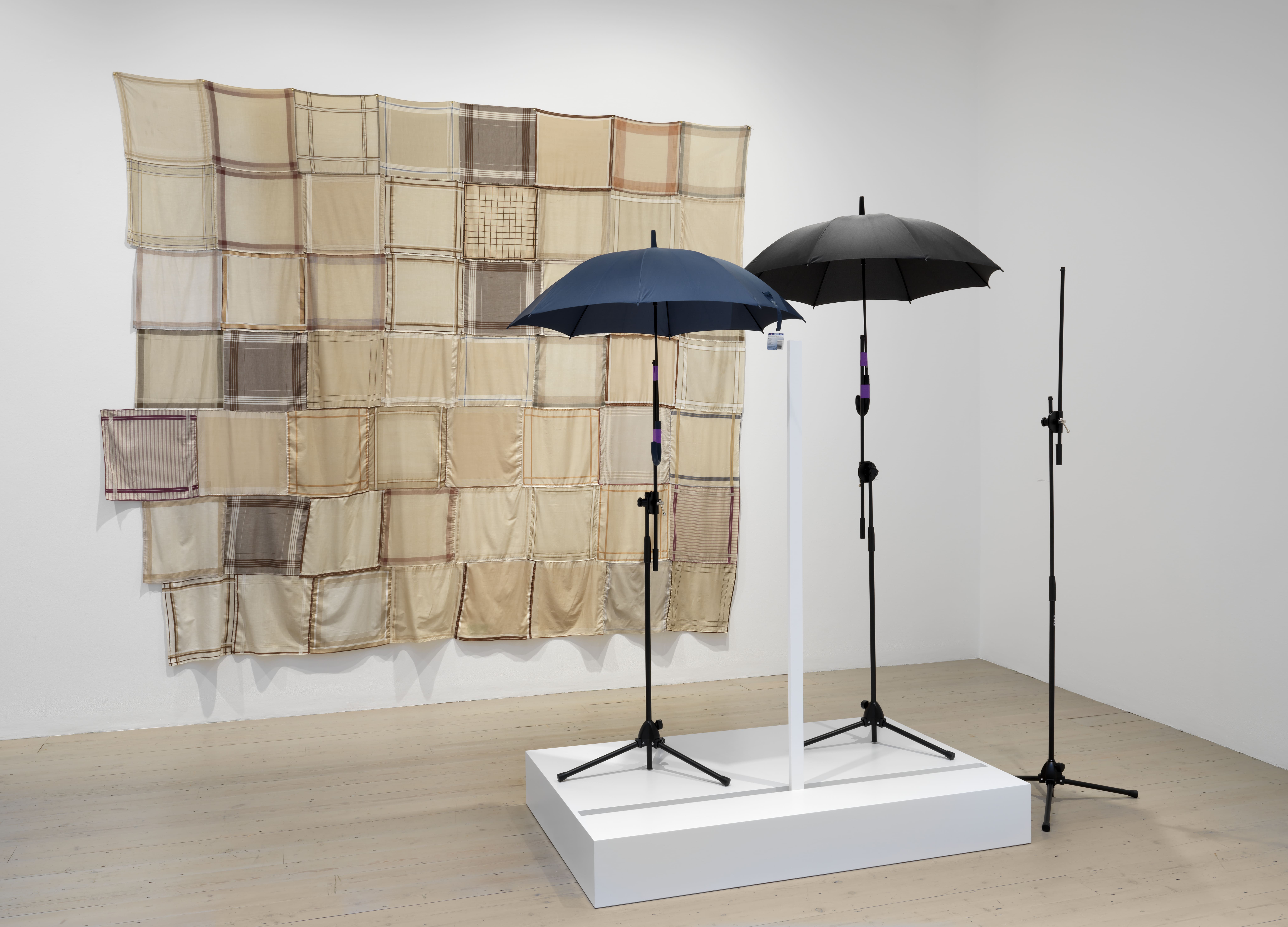 From left to right: 36 Men’s Handkerchiefs (The Fächerfest Panel), 1995, Grässlin Collection, St. Georgen | Cut! Cut! Cut!, 2010 Meyring Collection | Installation view, Cosima von Bonin: Upstairs Downstairs, Raven Row, 2025 Photograph by Marcus J Leith