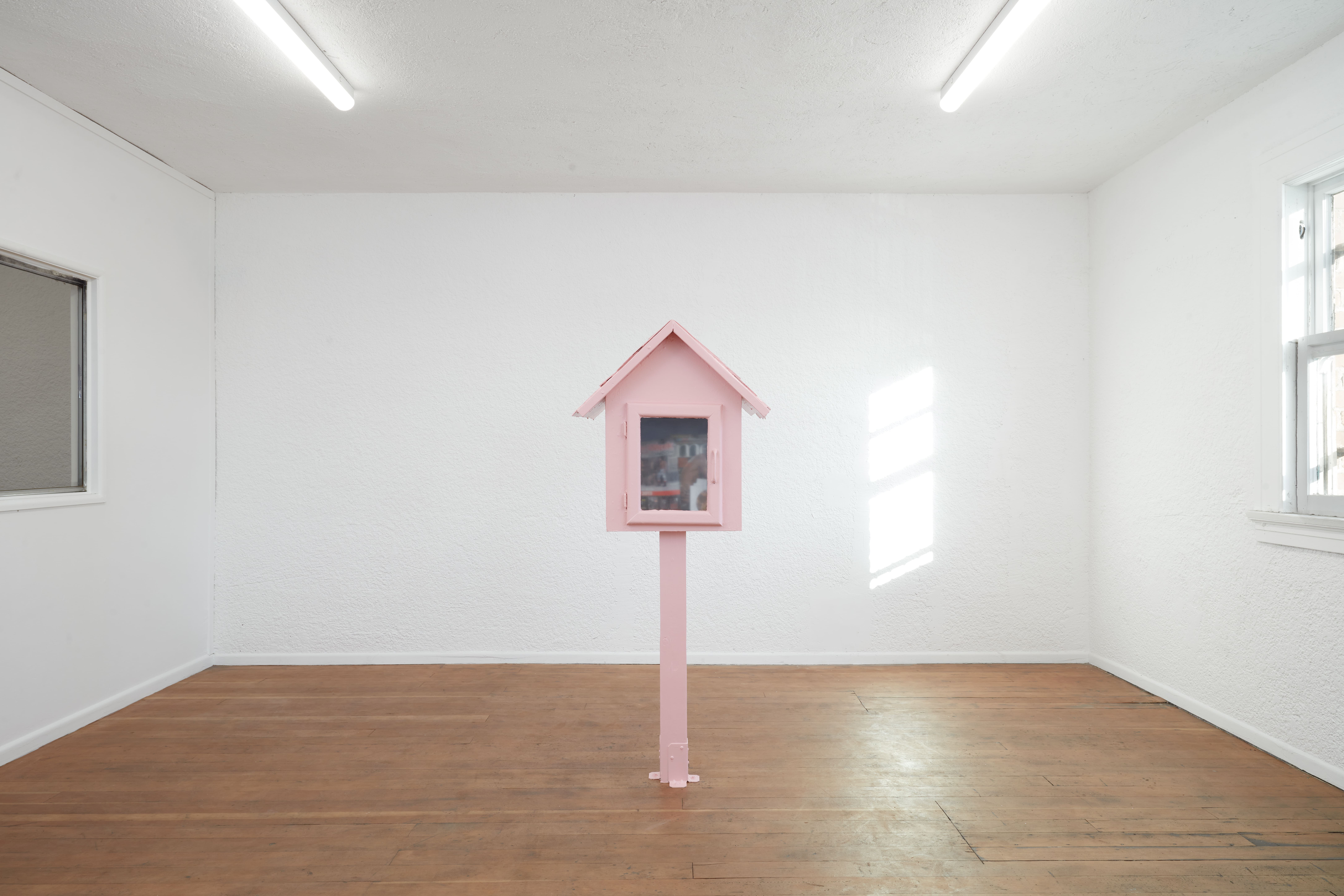 Louis Blue Newby, Commons, 2025. Found Little Free Library, pornography and erotic literature, Farrow & Ball No. 278 Nancy’s Blushes Full Gloss, 60.5 x 25.5 x 13 in. (153.7 x 64.8 x 33 cm). Courtesy of the artist and Ehrlich Steinberg, Los Angeles. Photos: Evan Walsh