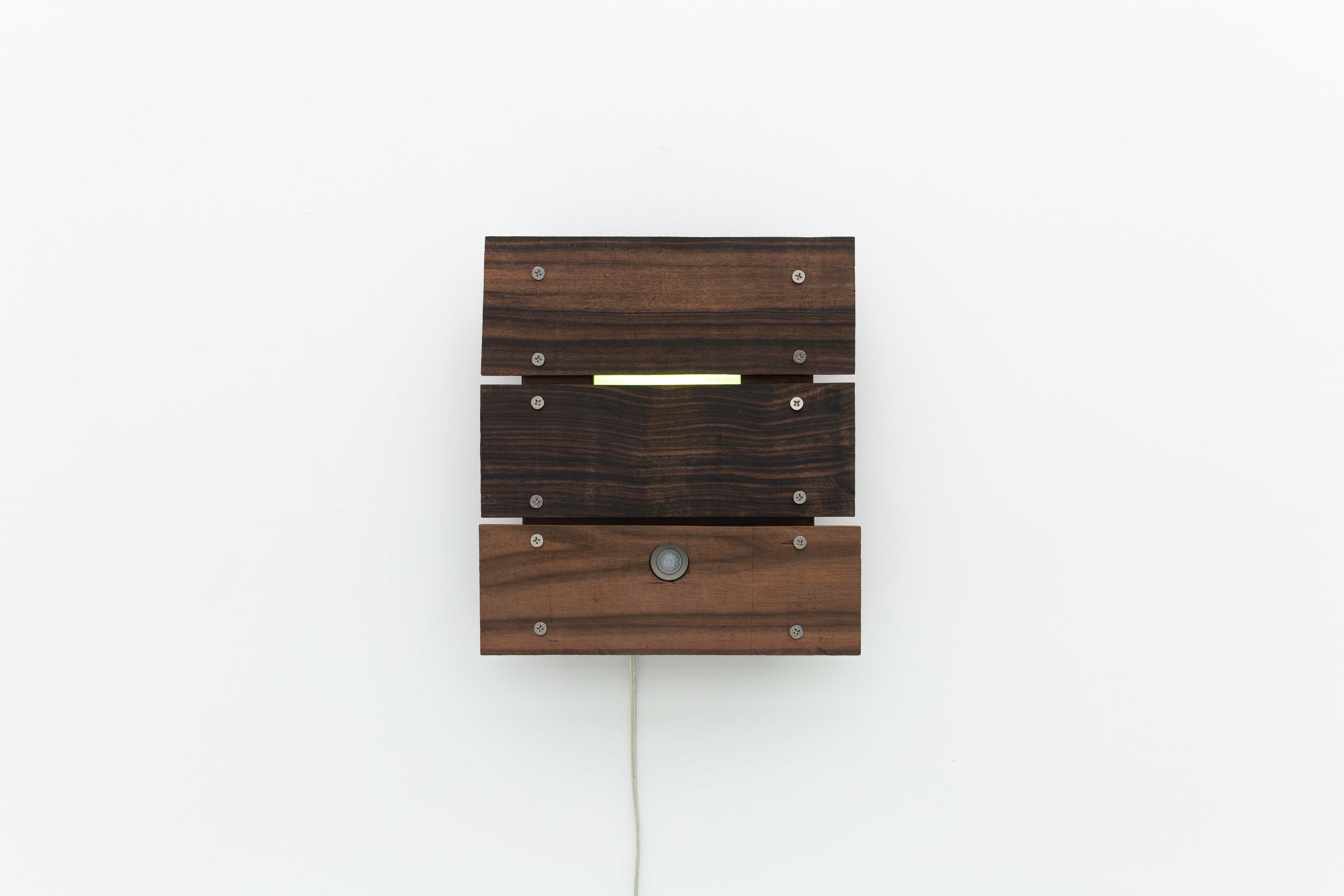 Yujin Chung, The Nightingale, 2025. Wood, nails, pigments, sensor light, 30 x 40 x 6 cm. Courtesy the artist and YK PRESENTS, Seoul.