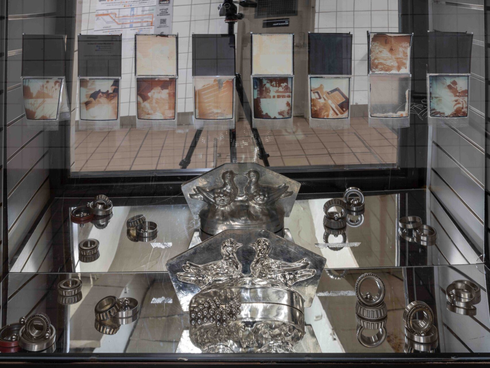 Craig Jun Li, Untitled, 2025 Altered SX-70 films, magnets, plexiglass, MDF 39 x 36 x 12.25 inches (variable). Courtesy of the artist and Emmelines.